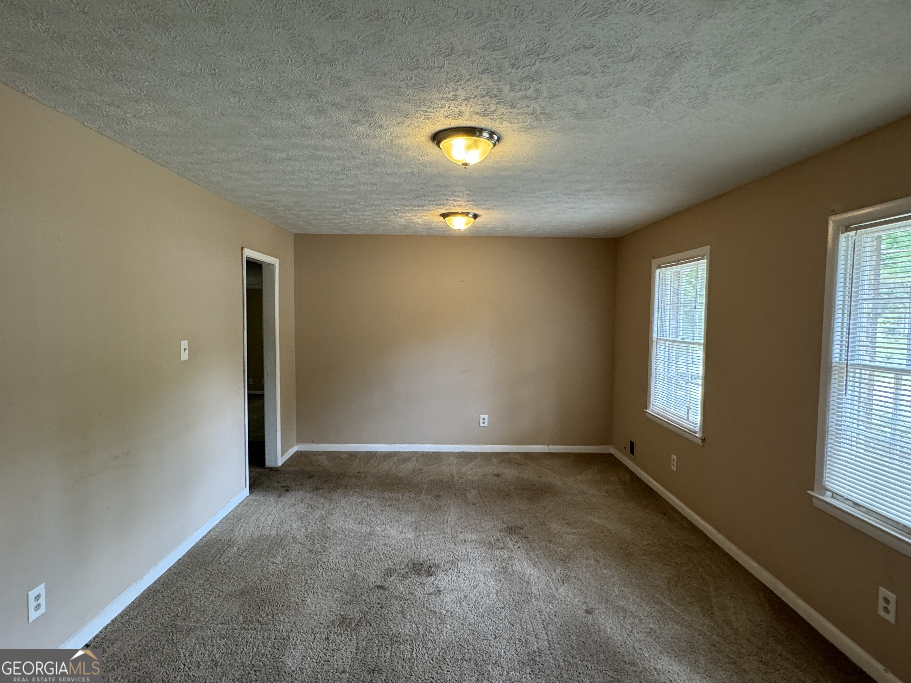 Property Photo:  3715 Leisure Lane  GA 30349 