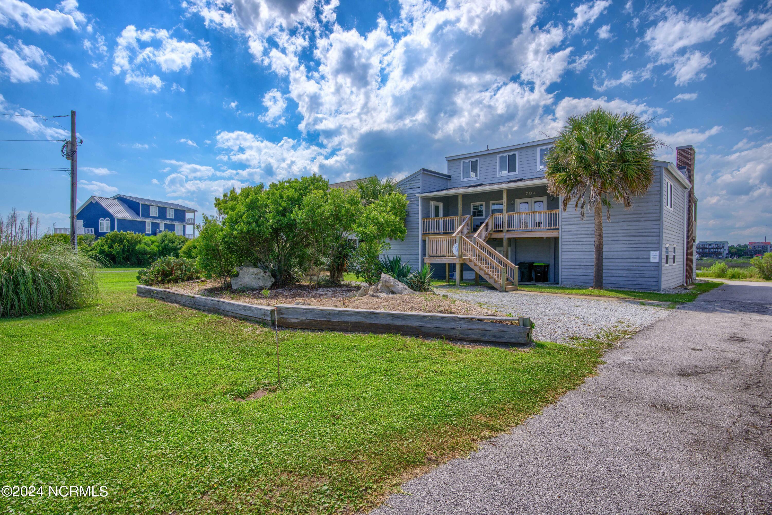 Property Photo:  704 Trade Winds Drive S  NC 28460 