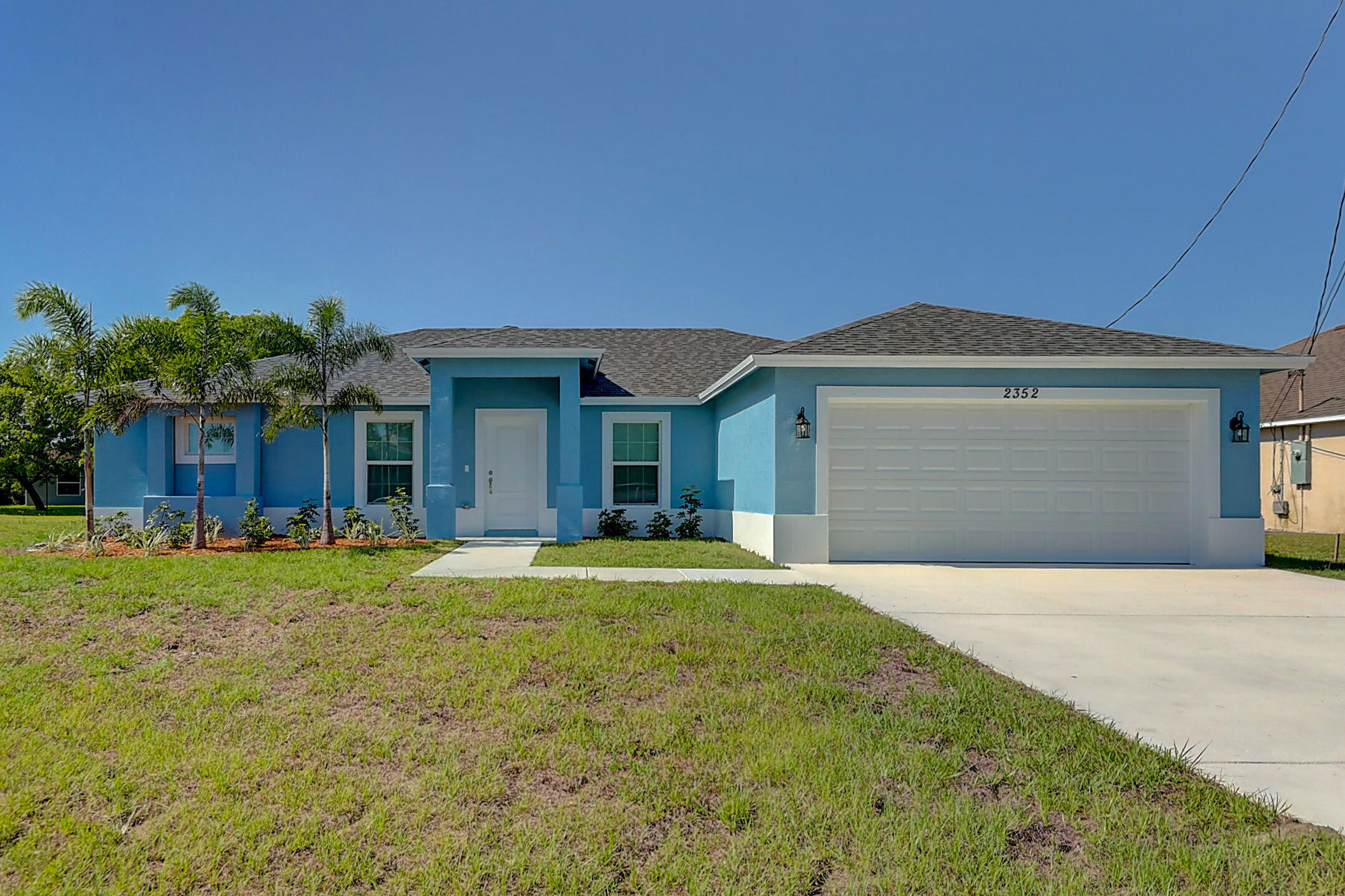 Property Photo: 2352 SW Plum Court FL 34953