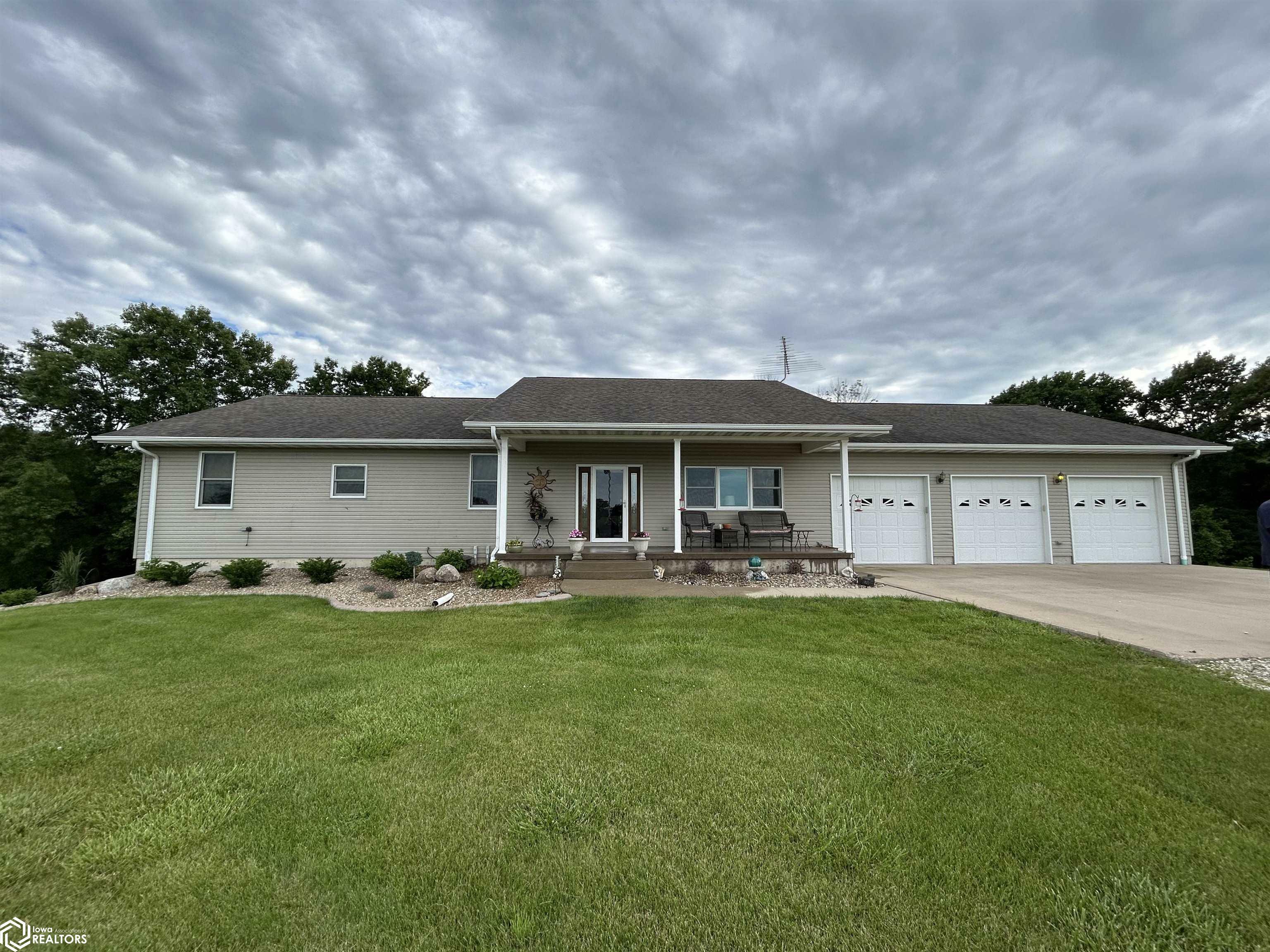 Property Photo:  18765 Olympic Road  IA 52660 