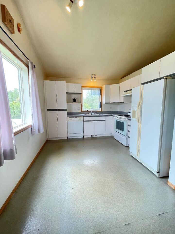 Property Photo: 1st Avenue SW 26 AB T0G 1J0