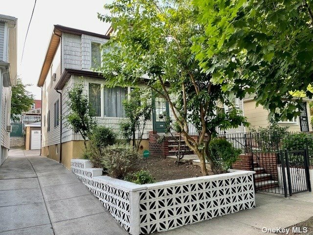 Property Photo:  50-67 45th Street  NY 11377 
