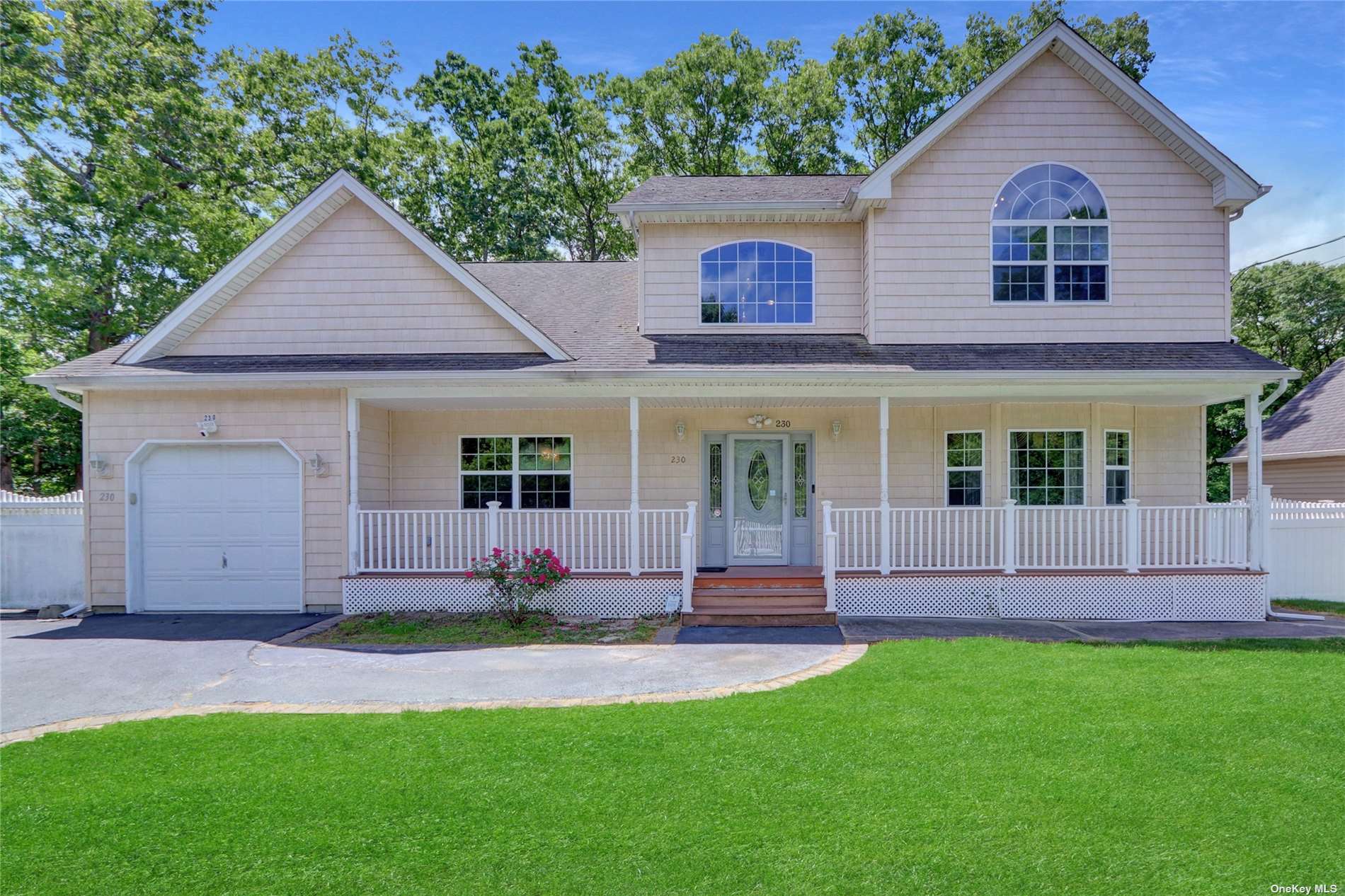 Property Photo:  230 Peconic Avenue  NY 11763 