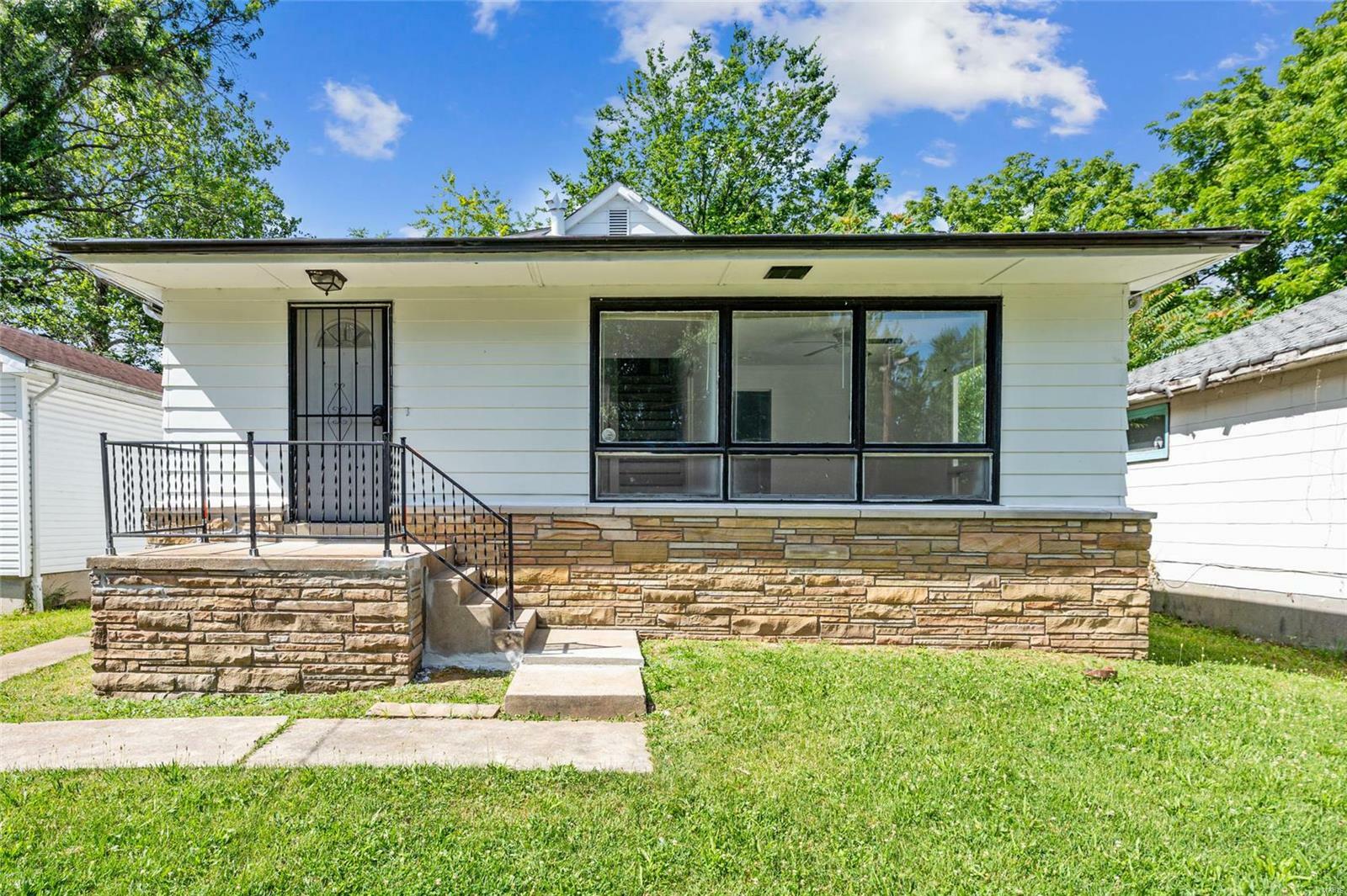 Property Photo:  7214 Harney Avenue  MO 63136 