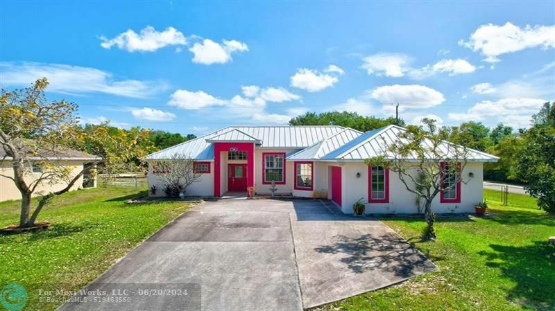 Property Photo:  590 SW Halkell Ave  FL 34953 