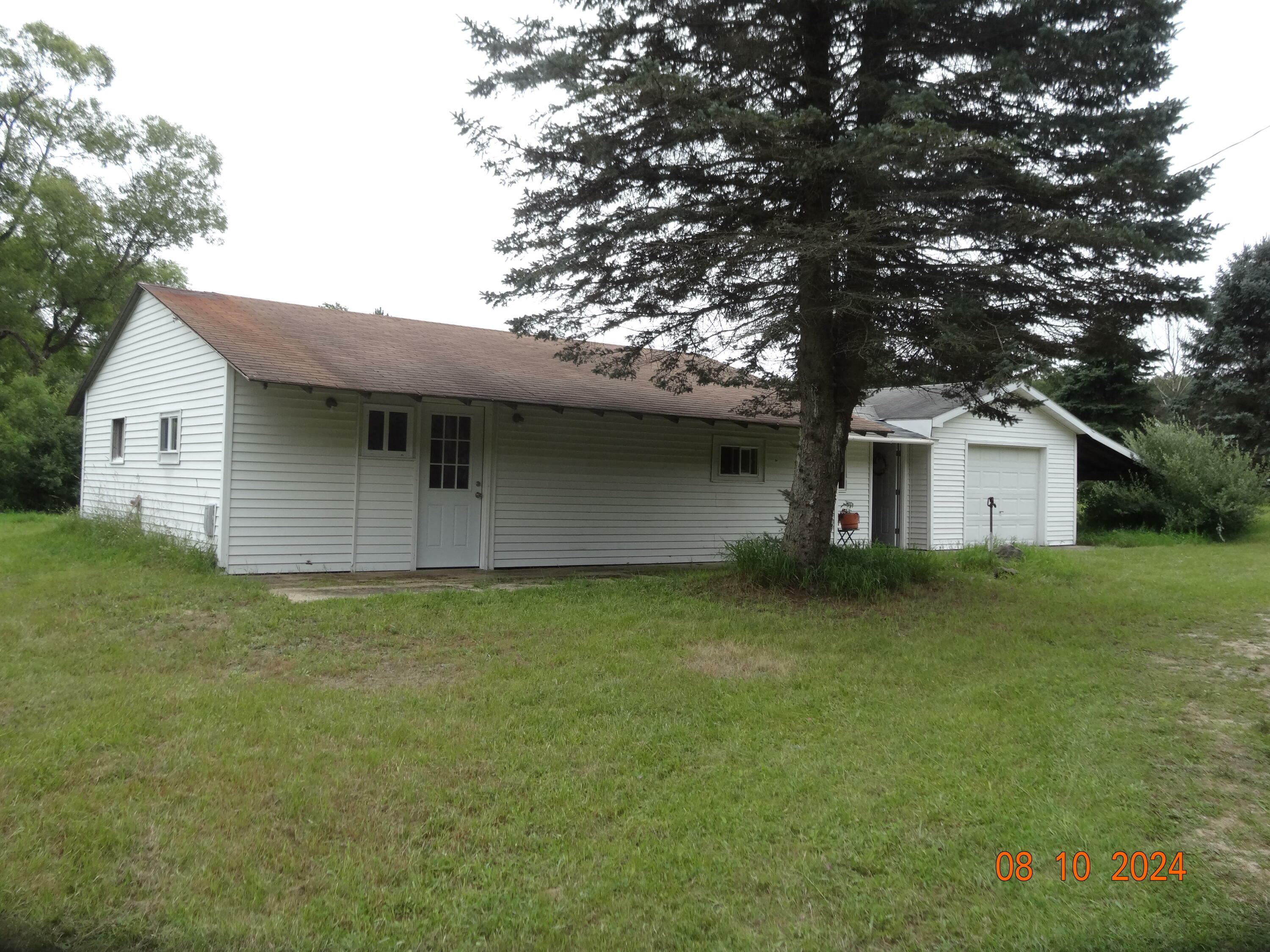 Property Photo:  6808 N Mac Road  MI 49644 