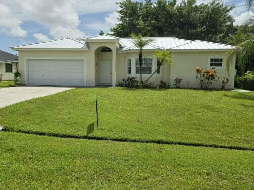 Property Photo:  1933 SE Cheltenham Street  FL 34983 