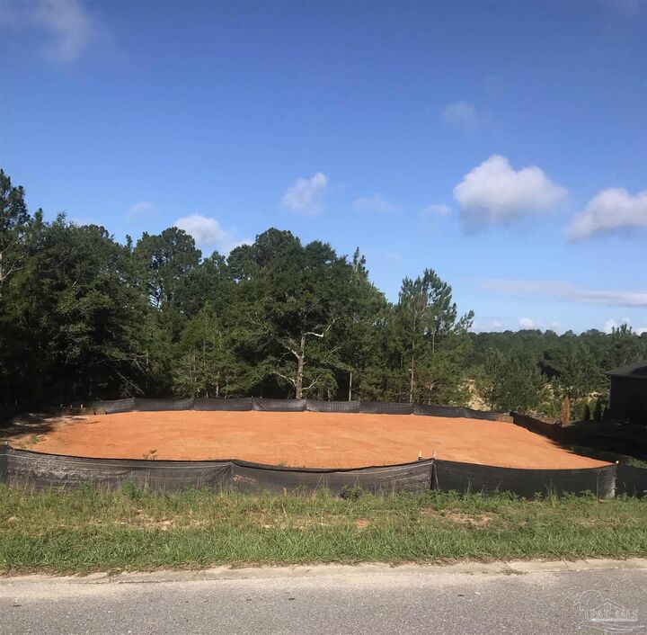 Property Photo:  5878 Saratoga Dr  FL 32536 