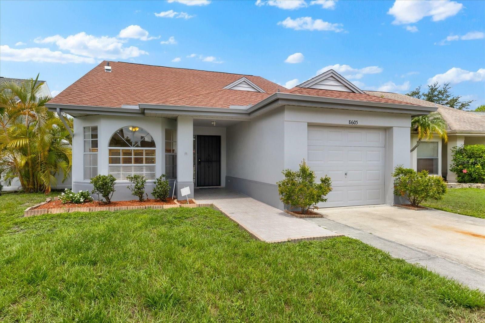 Property Photo:  8605 Cottonway Lane  FL 33635 