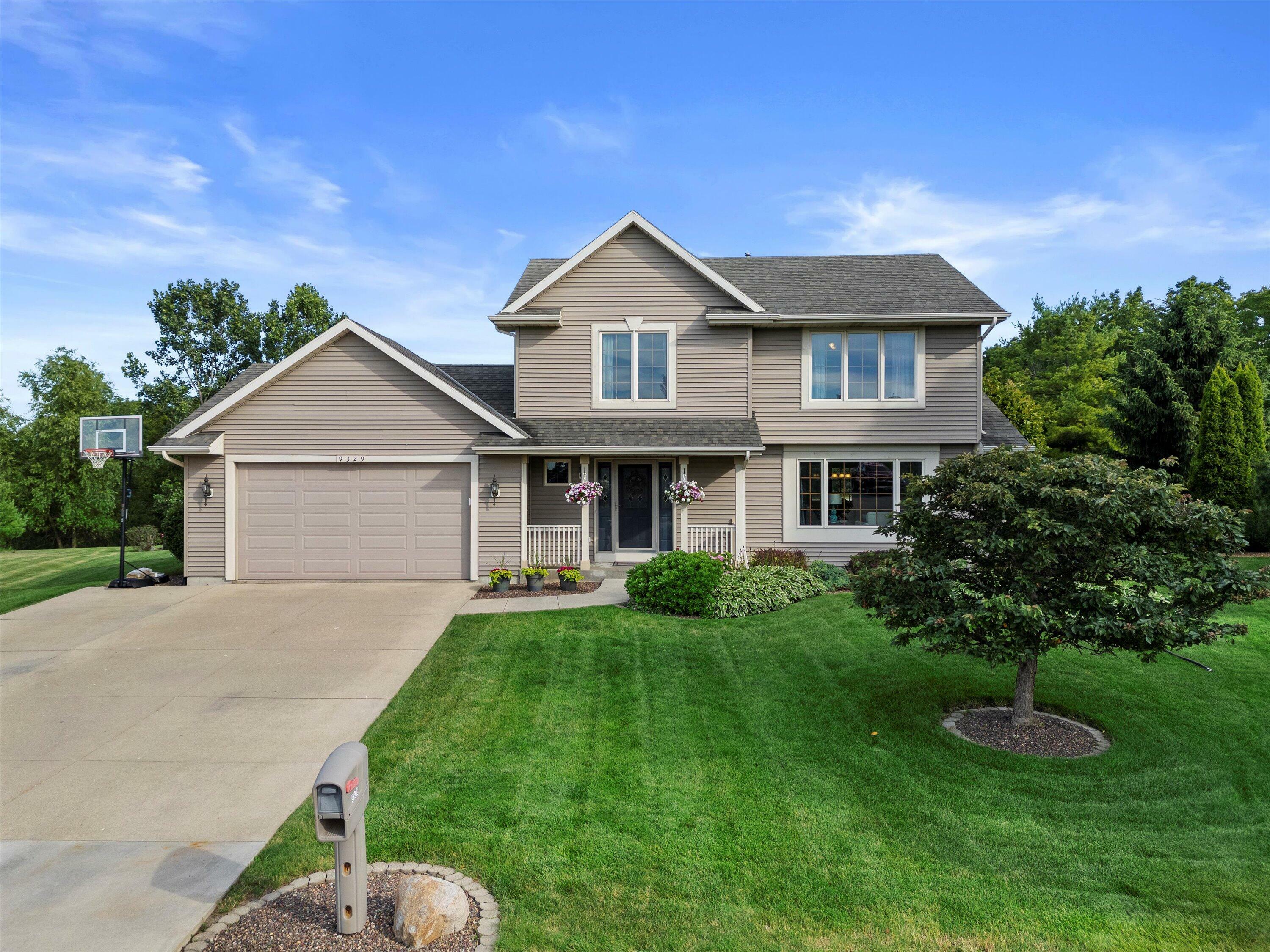 Property Photo:  9329 Conifer Ct  WI 53406 