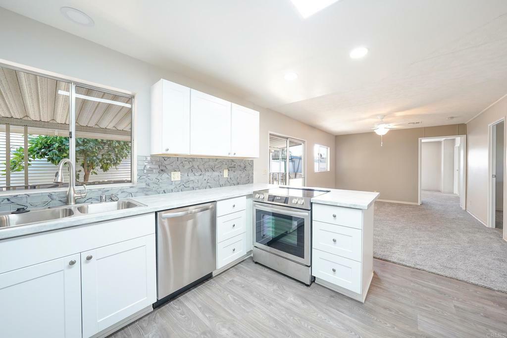 Property Photo:  1212 H Street 121  CA 92065 