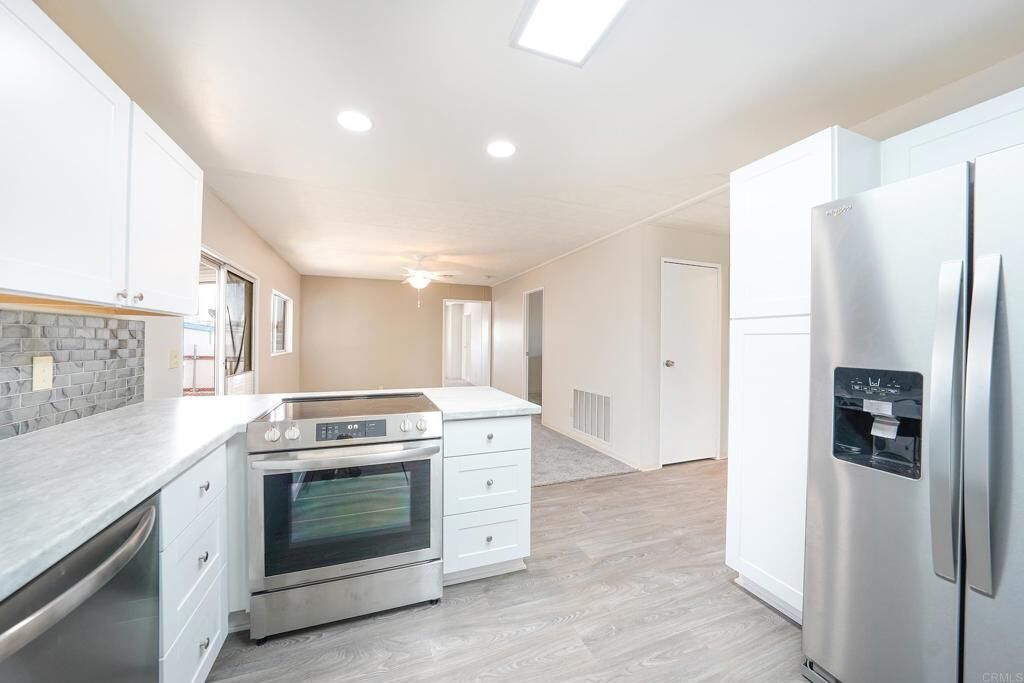 Property Photo:  1212 H Street 121  CA 92065 