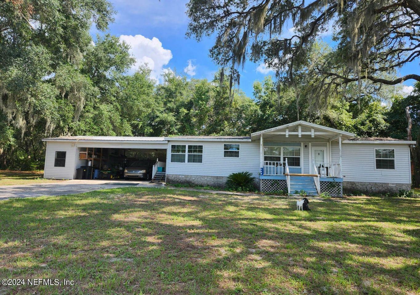 Property Photo:  901 County Road 308B  FL 32181 