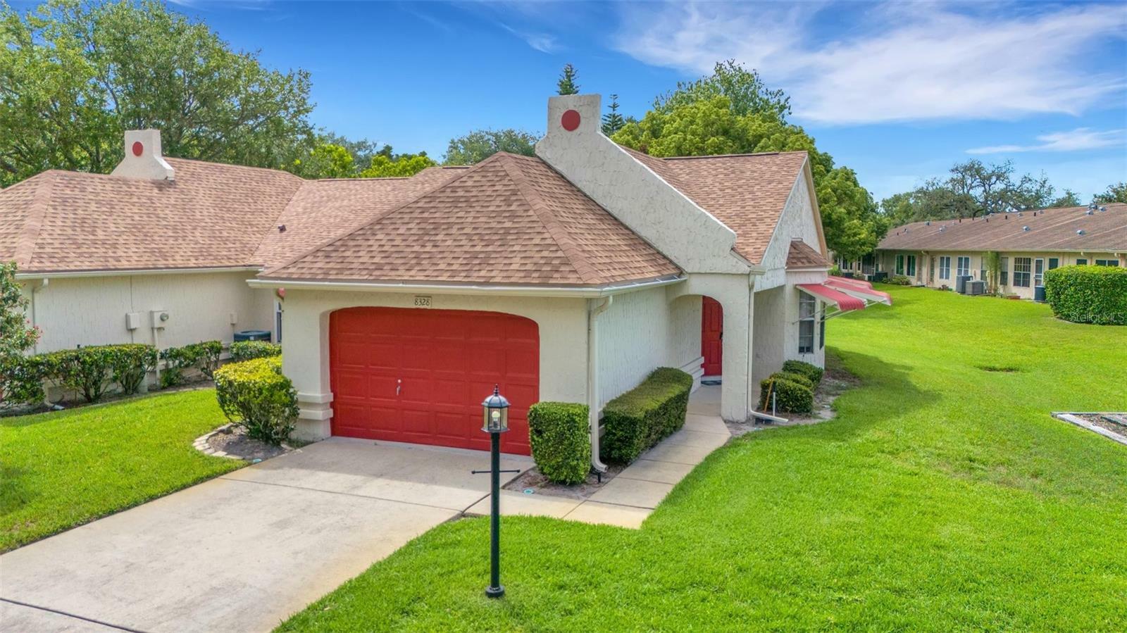 Property Photo:  8328 Monaco Drive  FL 34668 