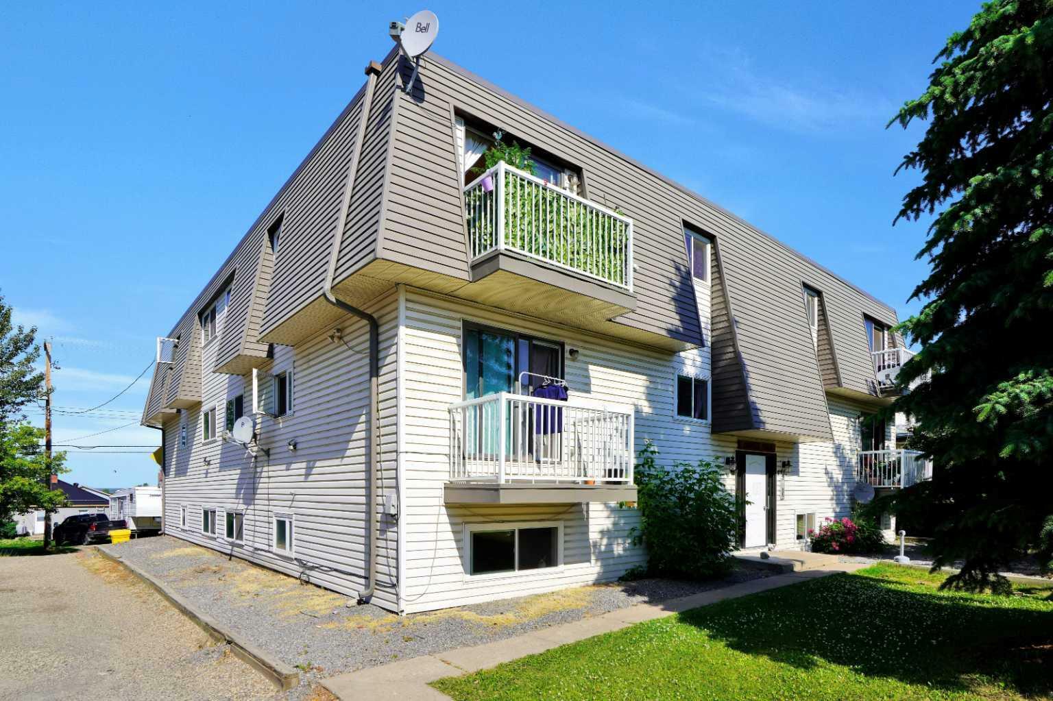 Property Photo:  4932 48 Street 11-14, 21-24, 31-34  AB T4T 1R1 