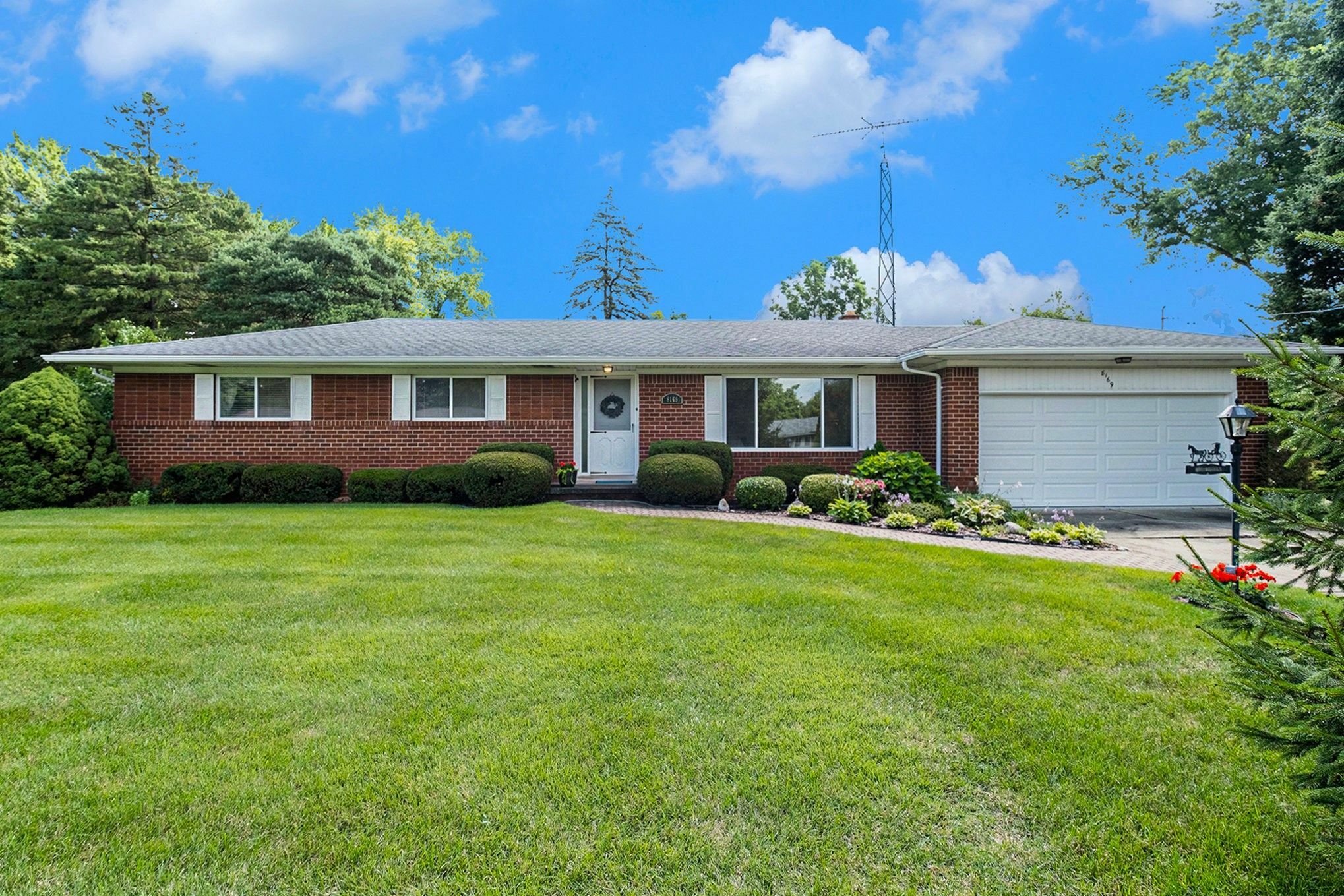 Property Photo:  8169 Dungarvin Drive  MI 48439 8166 