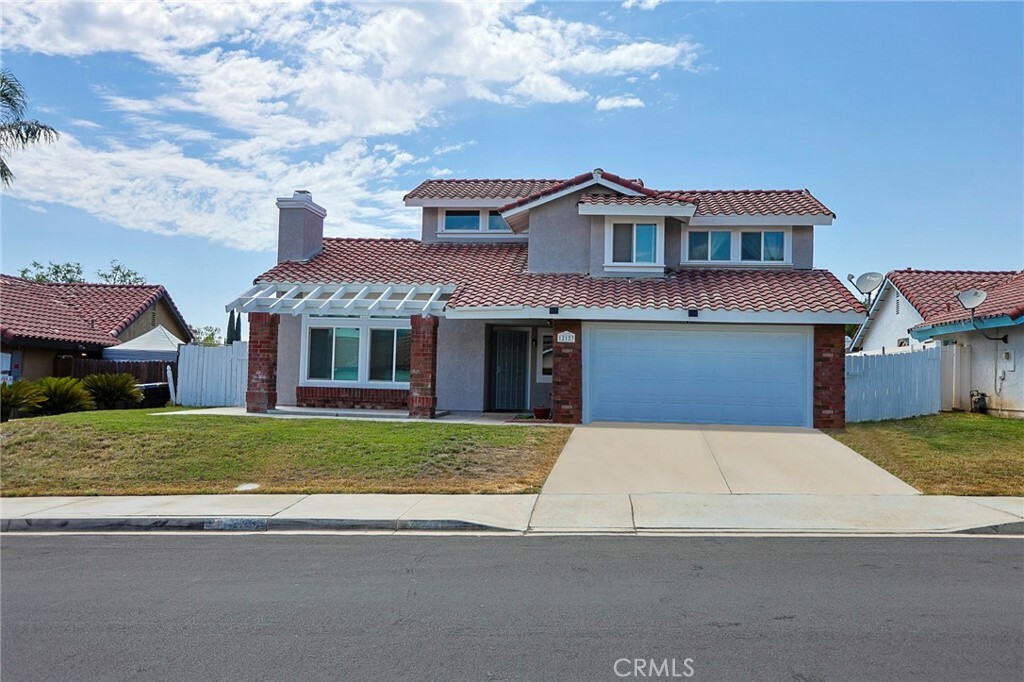 Property Photo:  12123 Champlain Street  CA 92557 