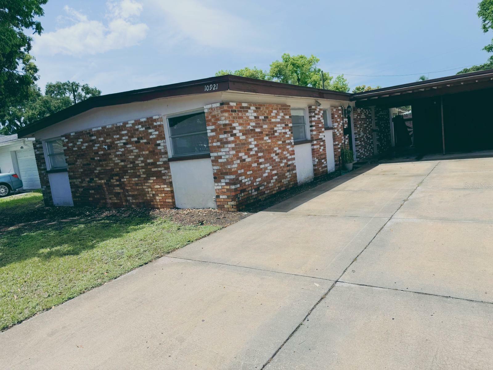 Property Photo:  10921 Temple Avenue  FL 33772 