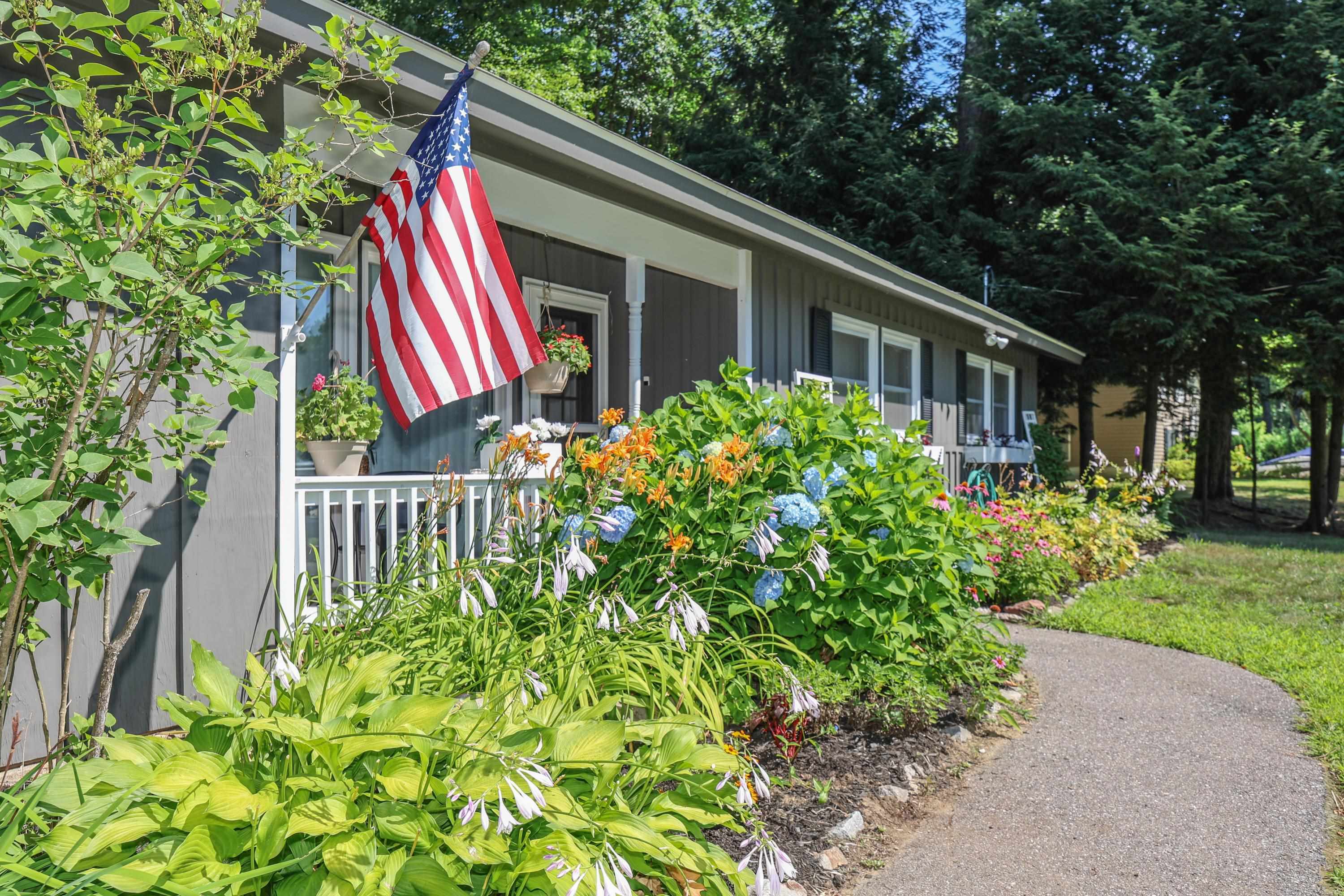 Property Photo: 14 Kensington Drive NH 03246