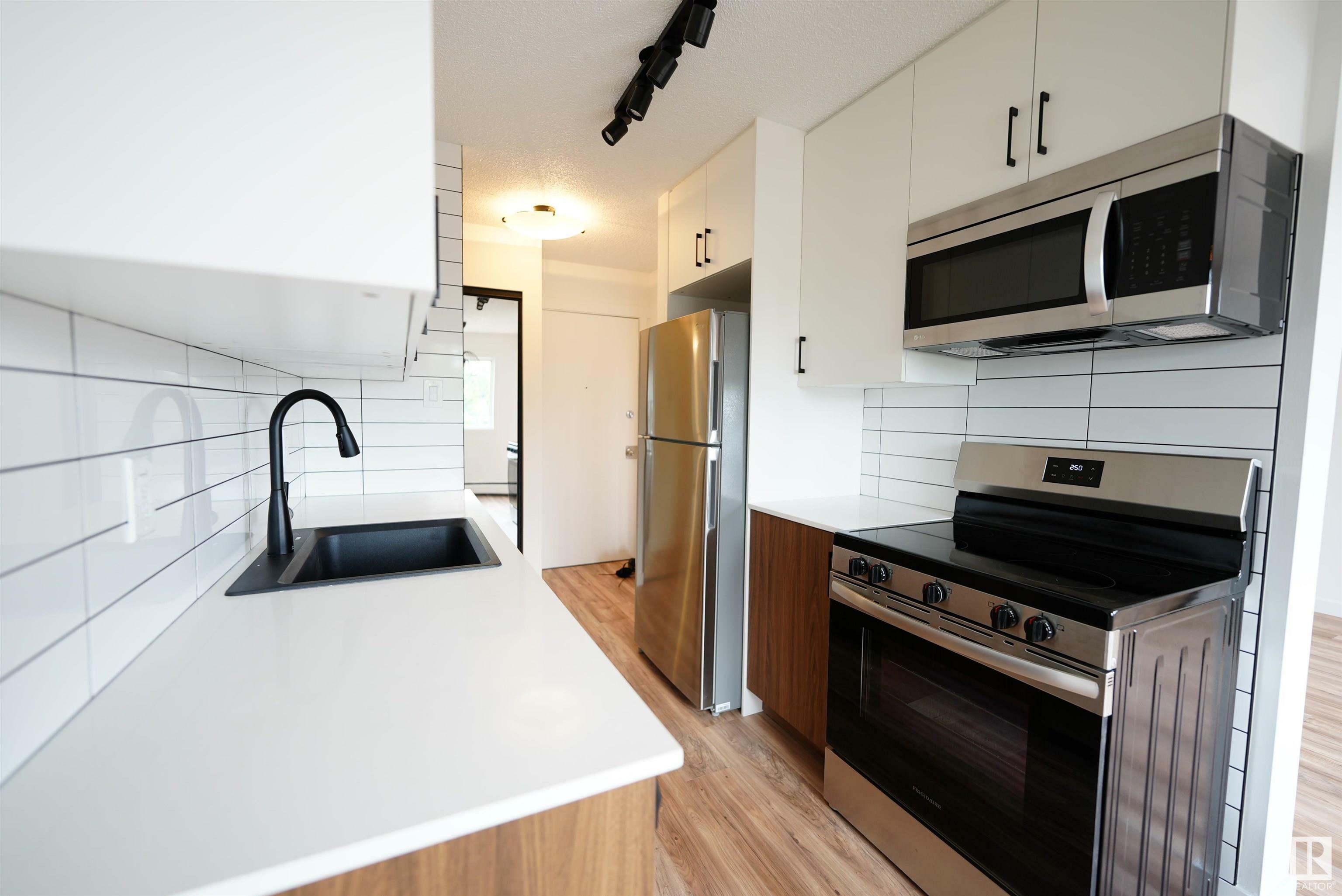 Property Photo:  11735 124 Street NW 309  AB T5M 0L1 