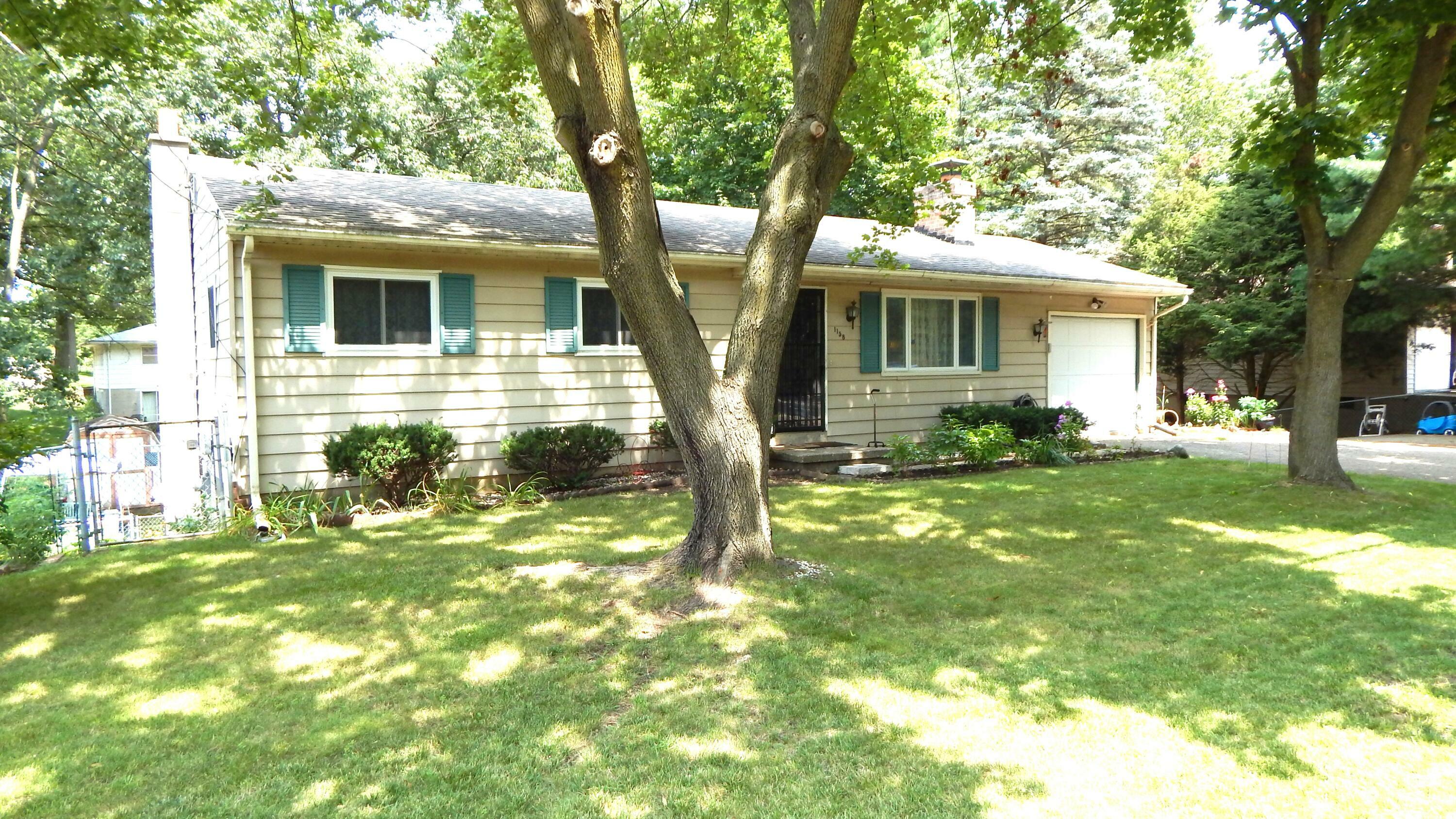 Property Photo:  1158 Avenue A  MI 49037 