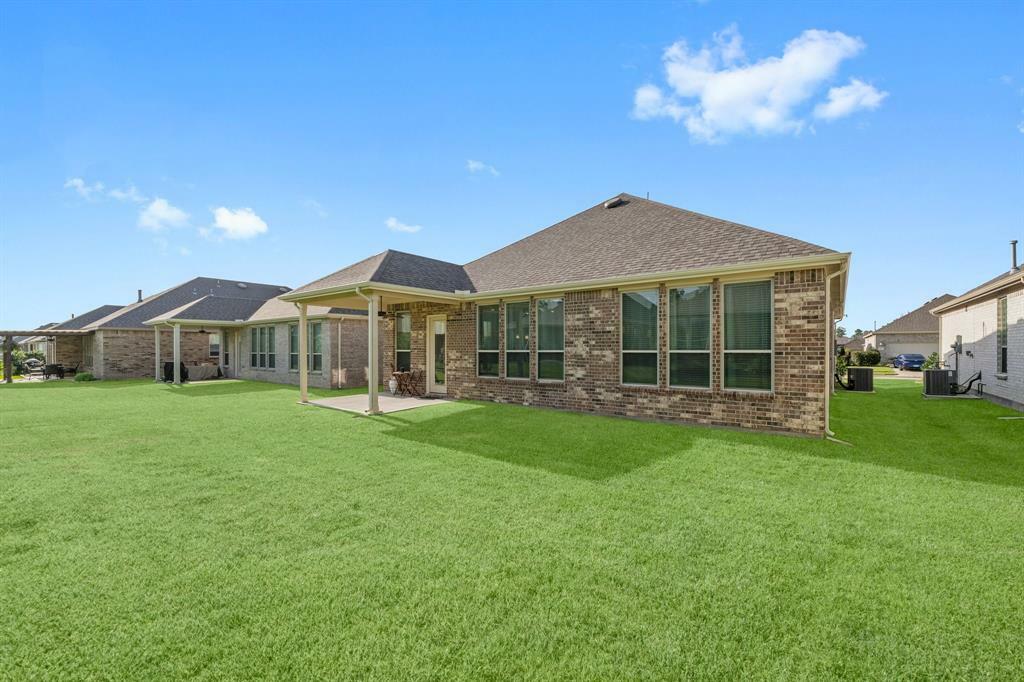 Property Photo:  135 Wild Wick Way  TX 77382 