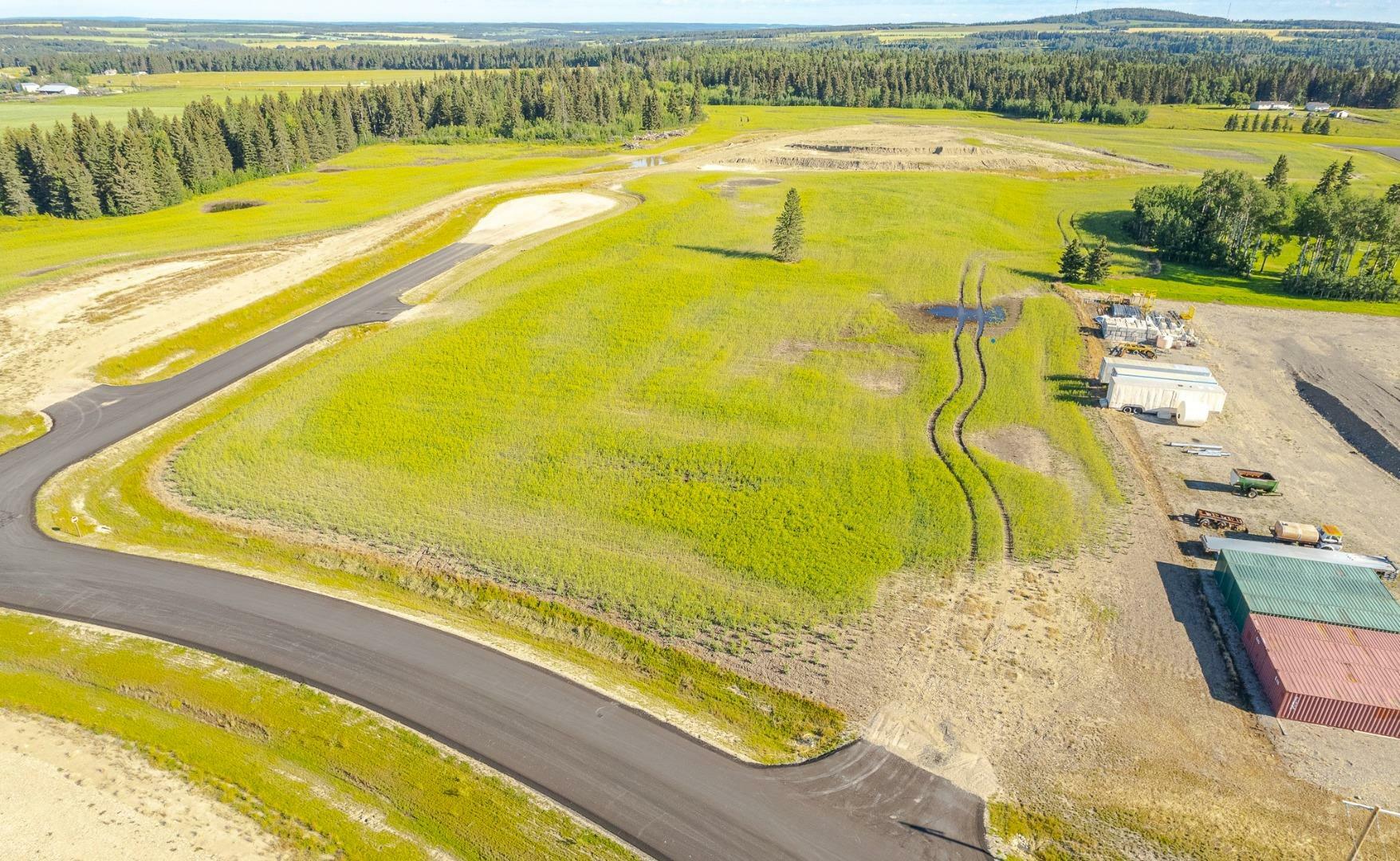 Property Photo:  #120-32532 Rr42  AB T0M 1X0 