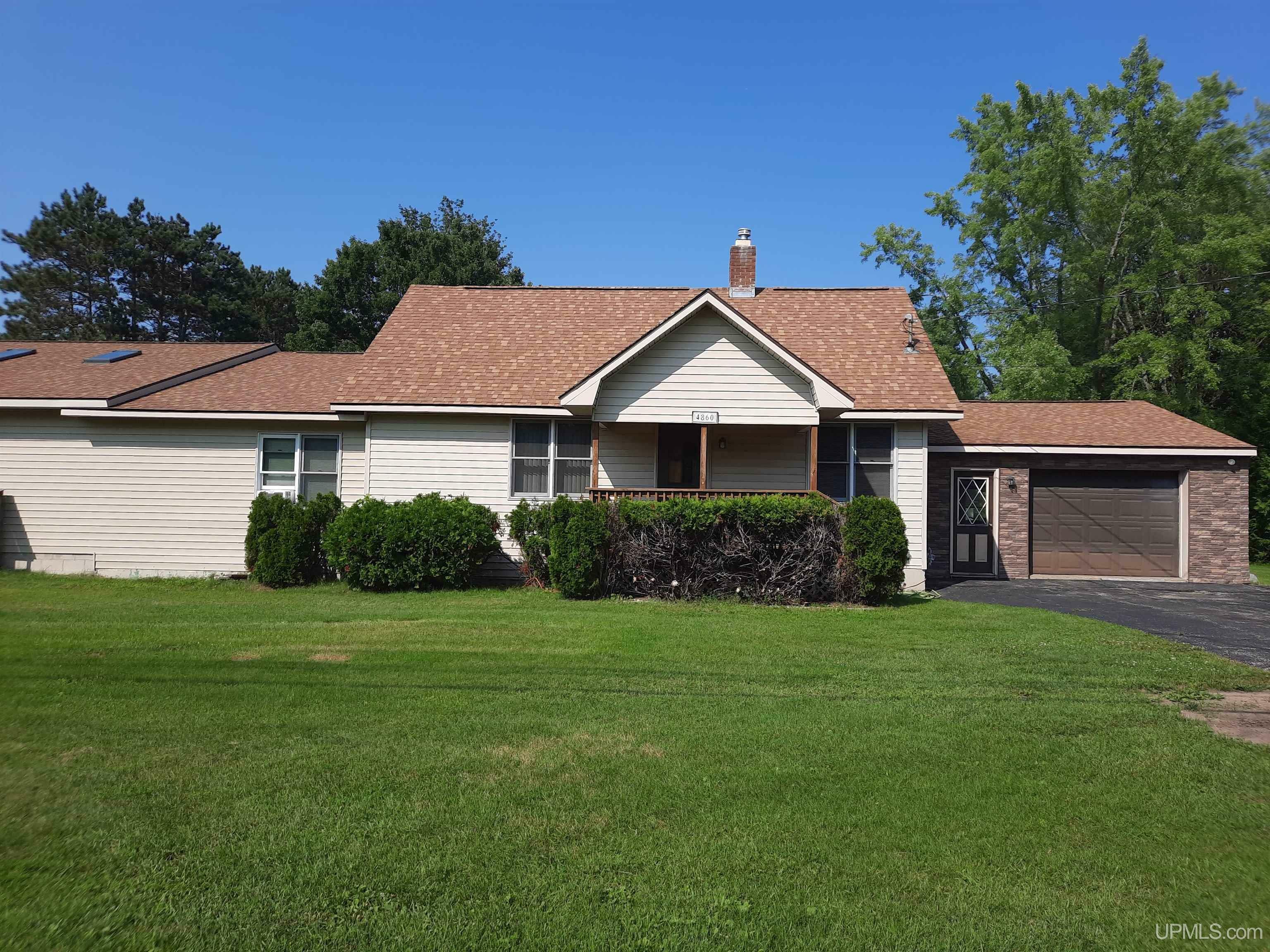 Property Photo:  4860 Danforth Road  MI 49829 