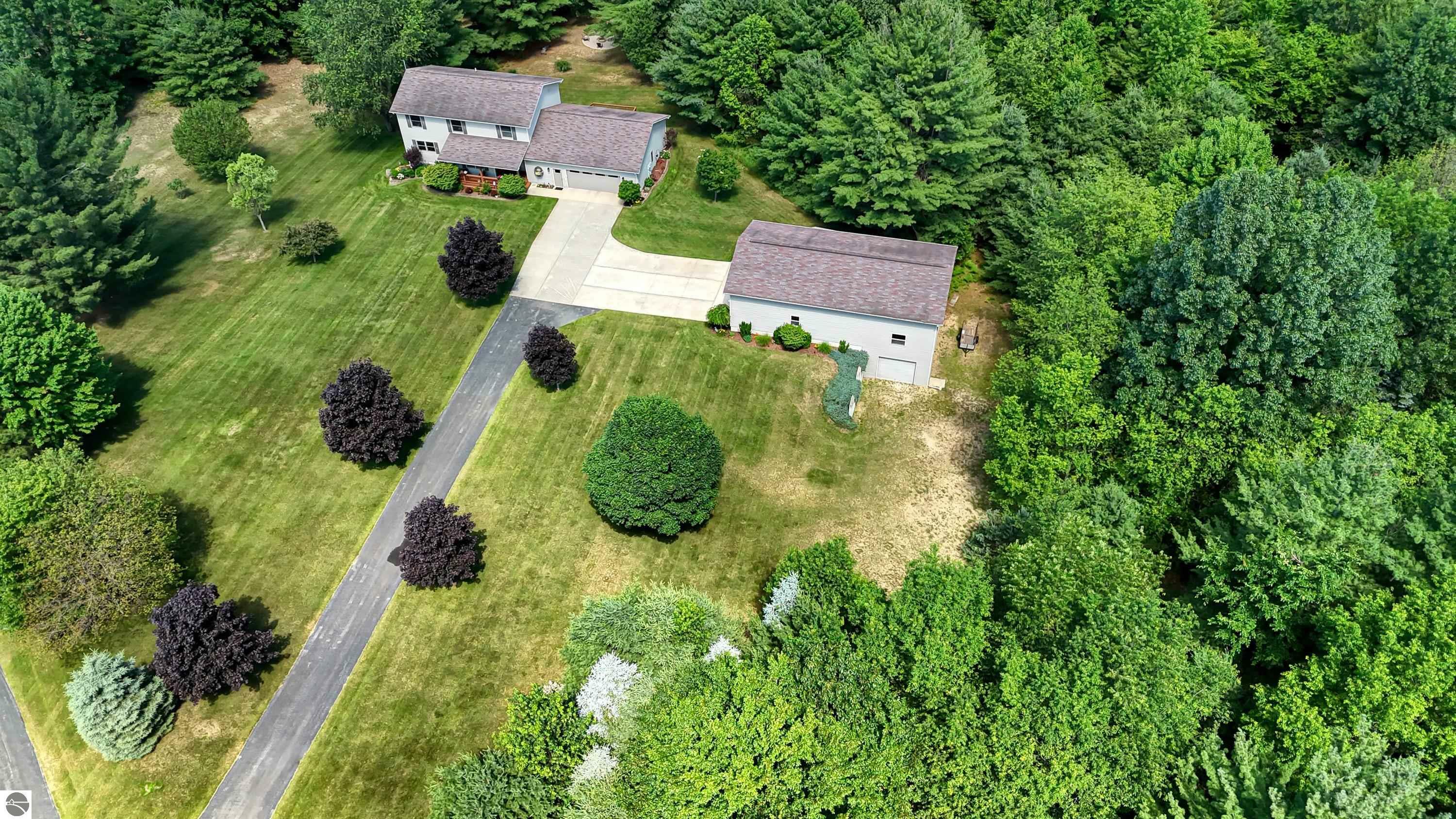 Property Photo:  1025 Bass Lake Road  MI 49685 