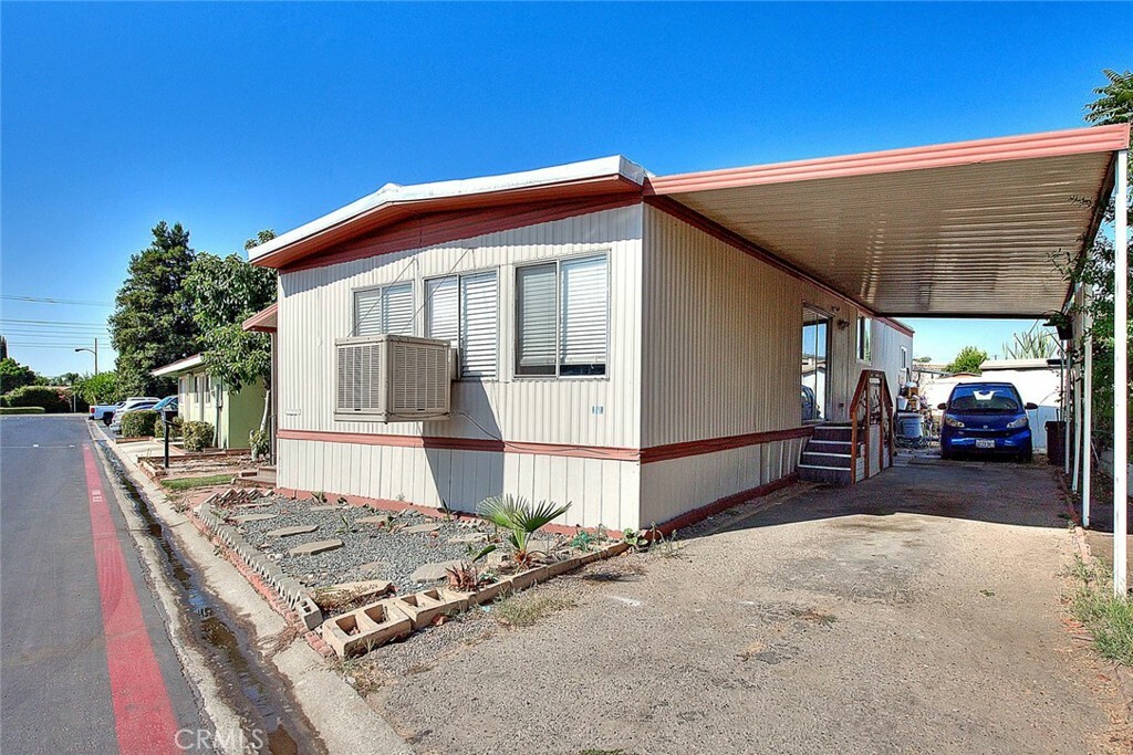 Property Photo:  2930 W Rialto Ave 29  CA 92376 