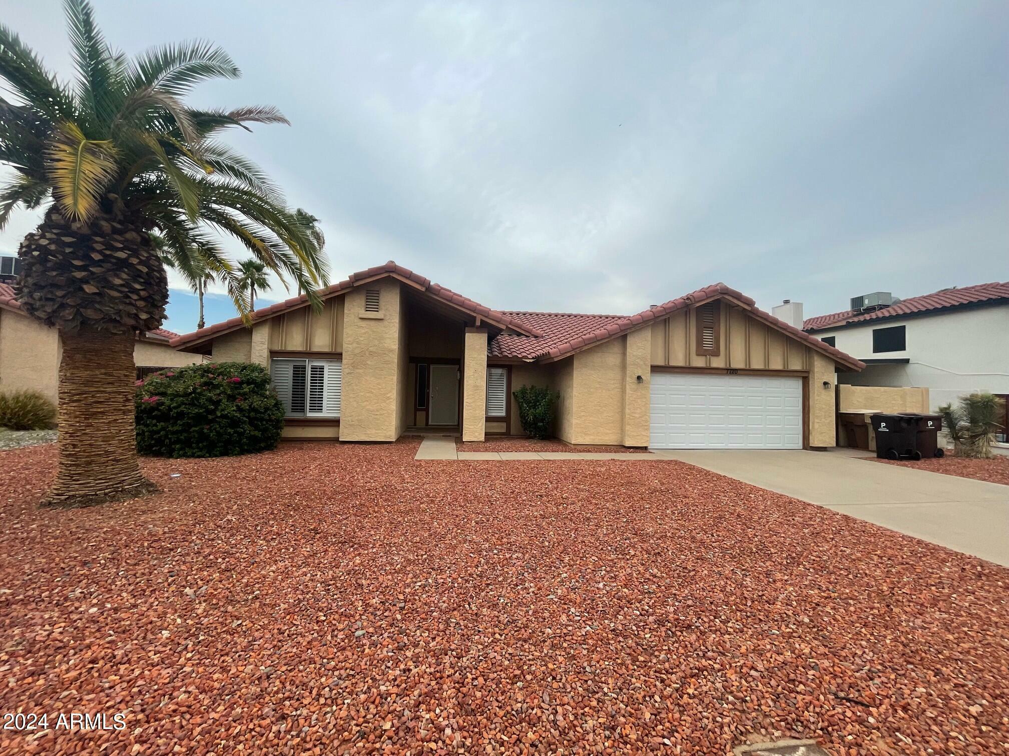 Property Photo:  7720 W Cholla Street  AZ 85345 