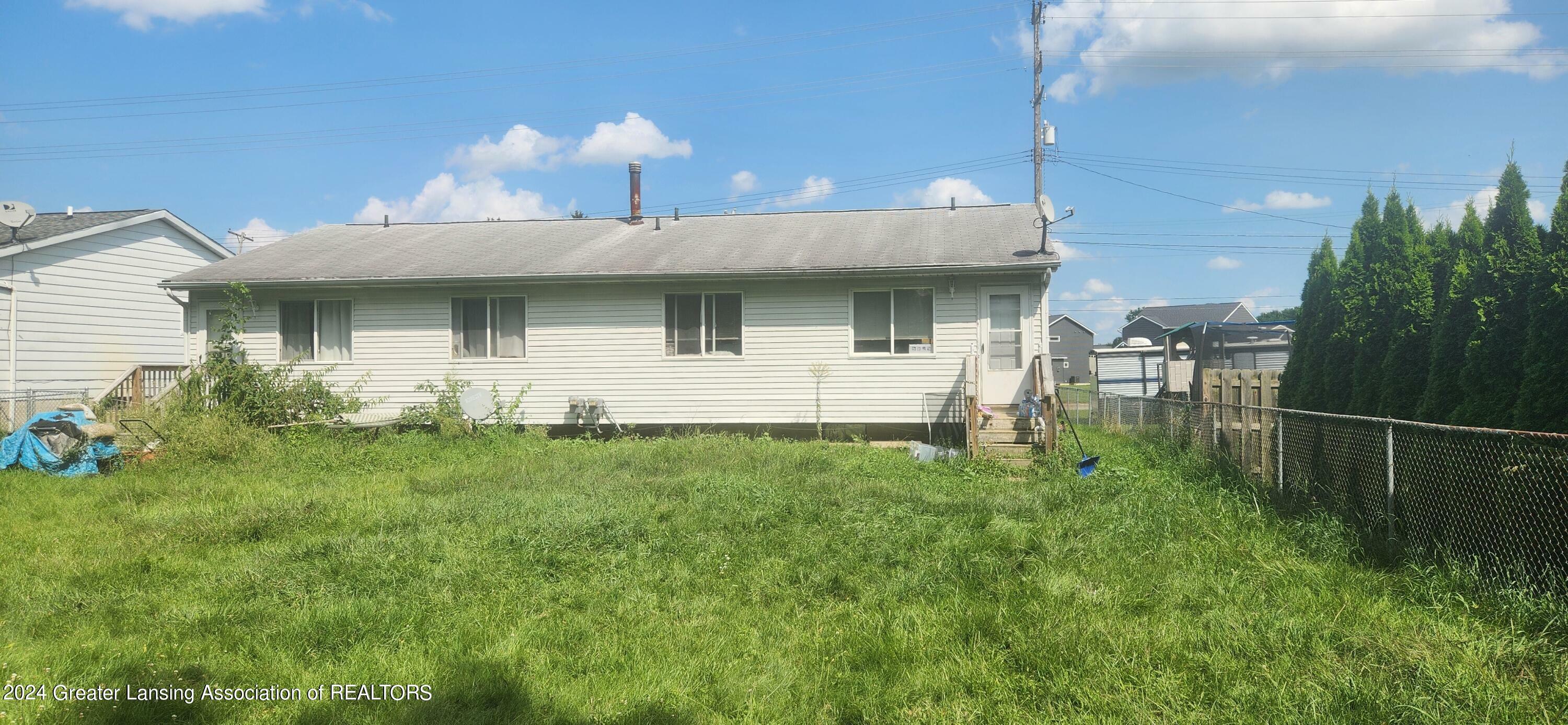 Property Photo:  6622/6624 Aurelius Road  MI 48911 