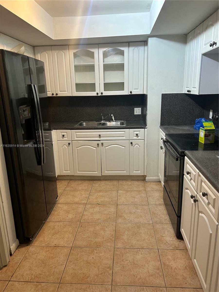 Property Photo:  1840 NW 119th St 503  FL 33167 