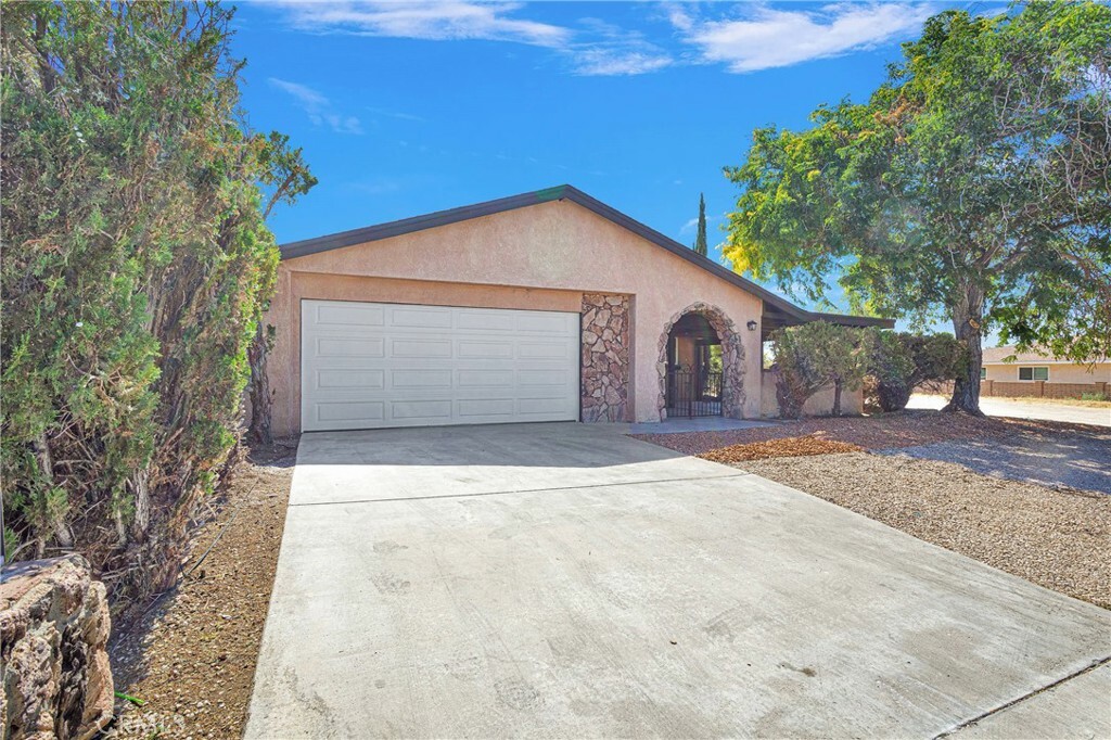 Property Photo: 13921 Burning Tree Drive CA 92395