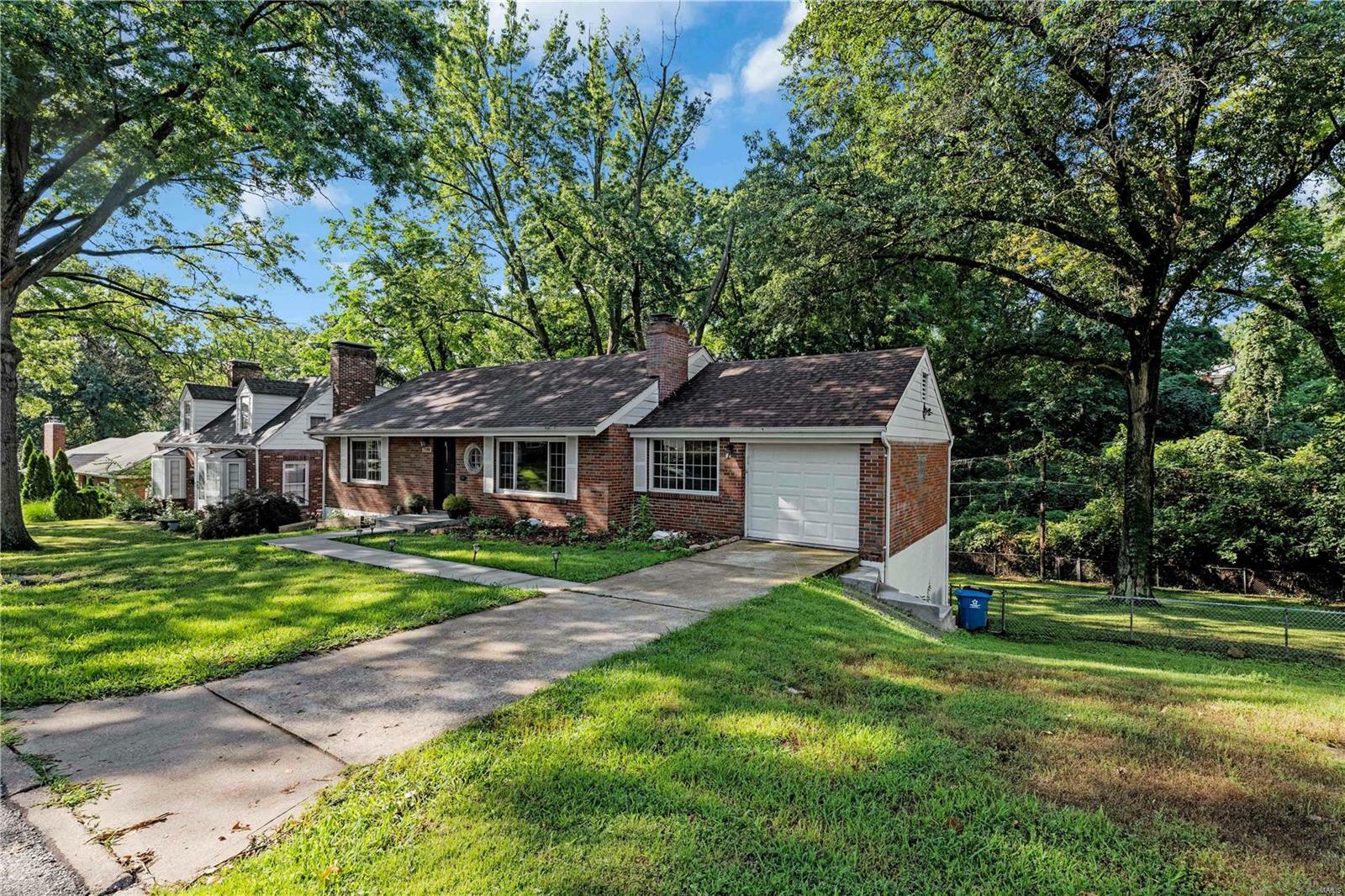 Property Photo:  7110 Roland Boulevard  MO 63121 