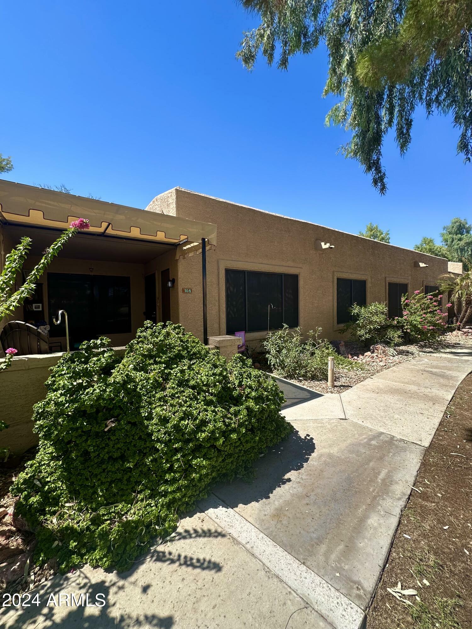 Property Photo:  14300 W Bell Road 164  AZ 85374 