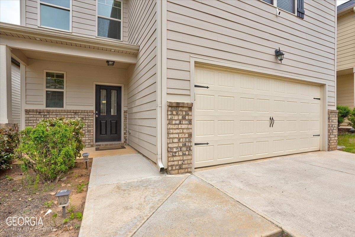 Property Photo:  144 Emporia Loop  GA 30253 