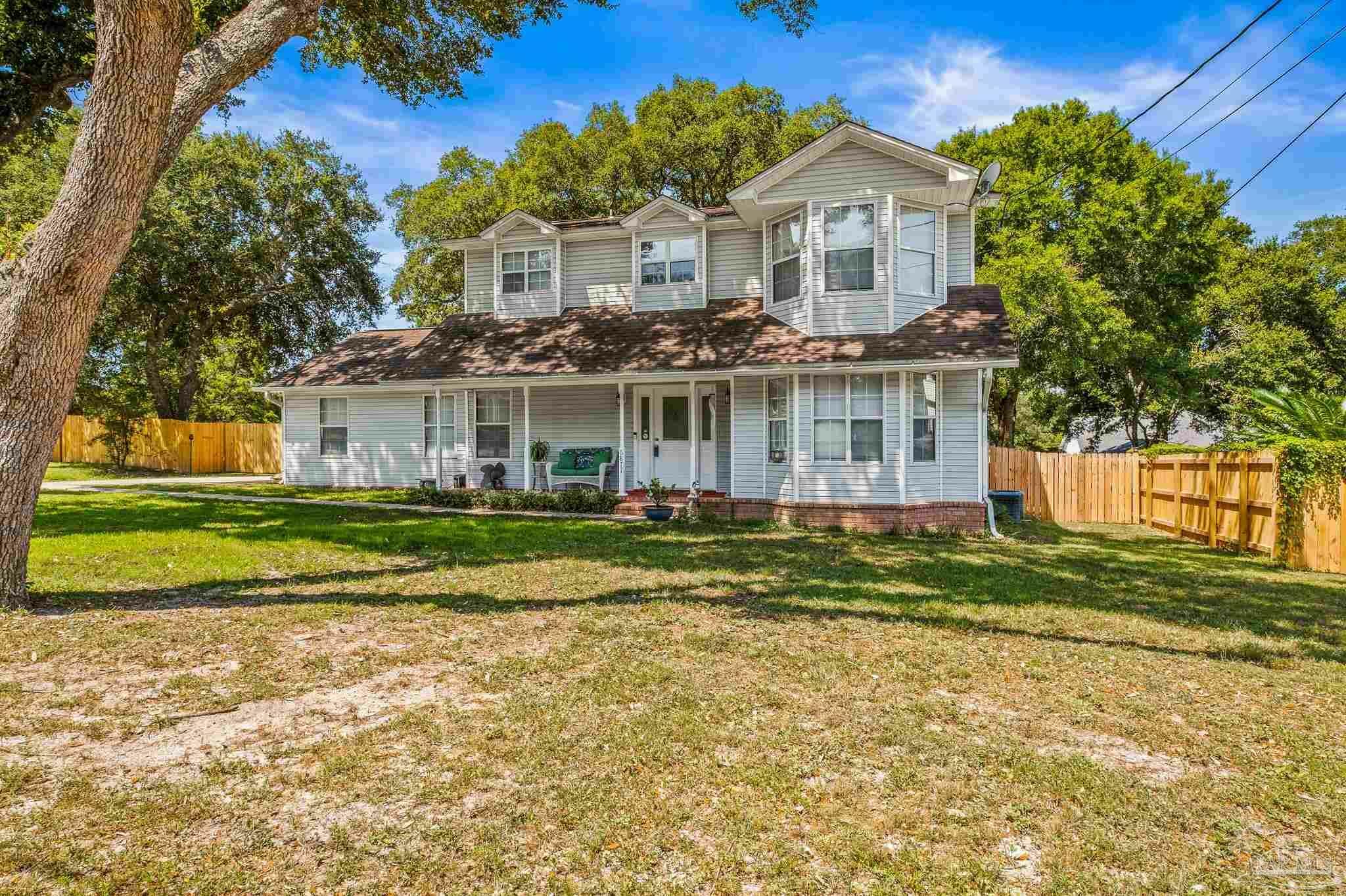 Property Photo:  6877 Cedar Lake Dr  FL 32526 