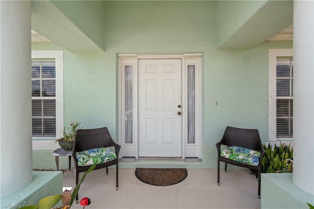 Property Photo:  1240 NW 26th Ave  FL 33993 