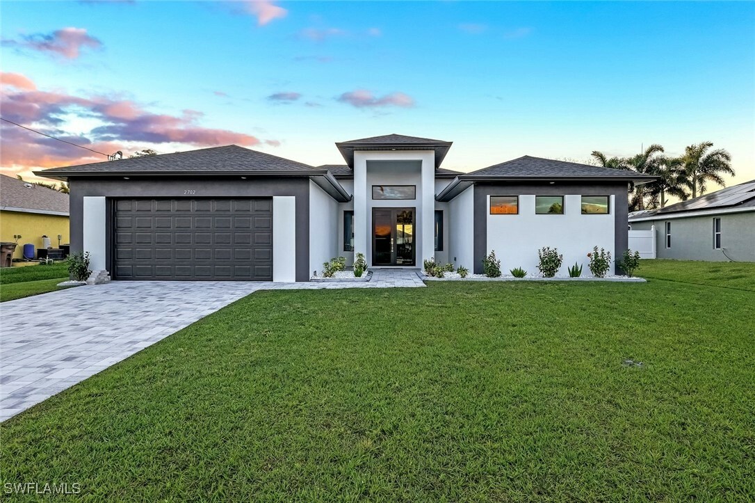 Property Photo: 2702 SW 21st Place FL 33914