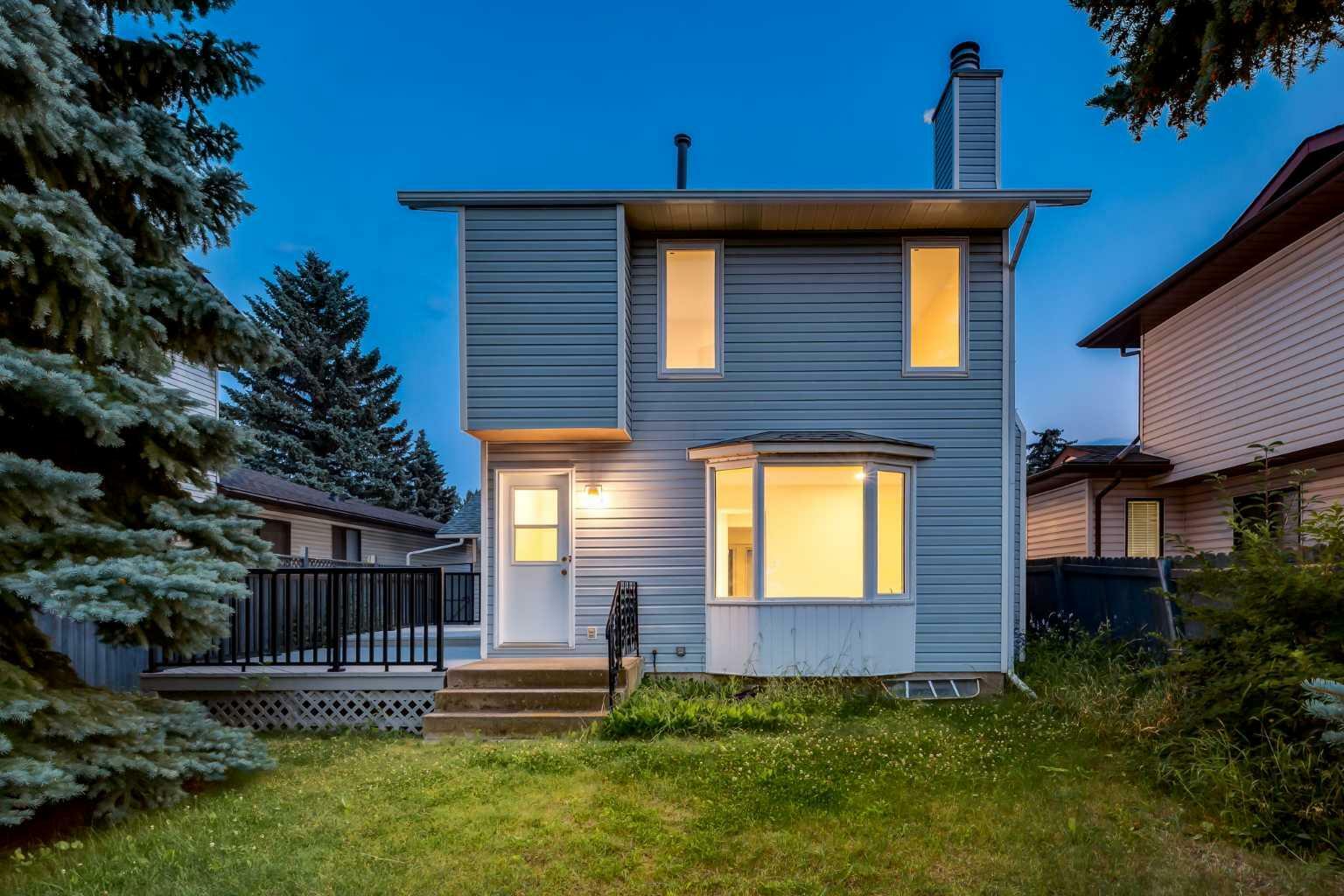 Property Photo:  56 Woodview Court SW  AB T2W 4X4 