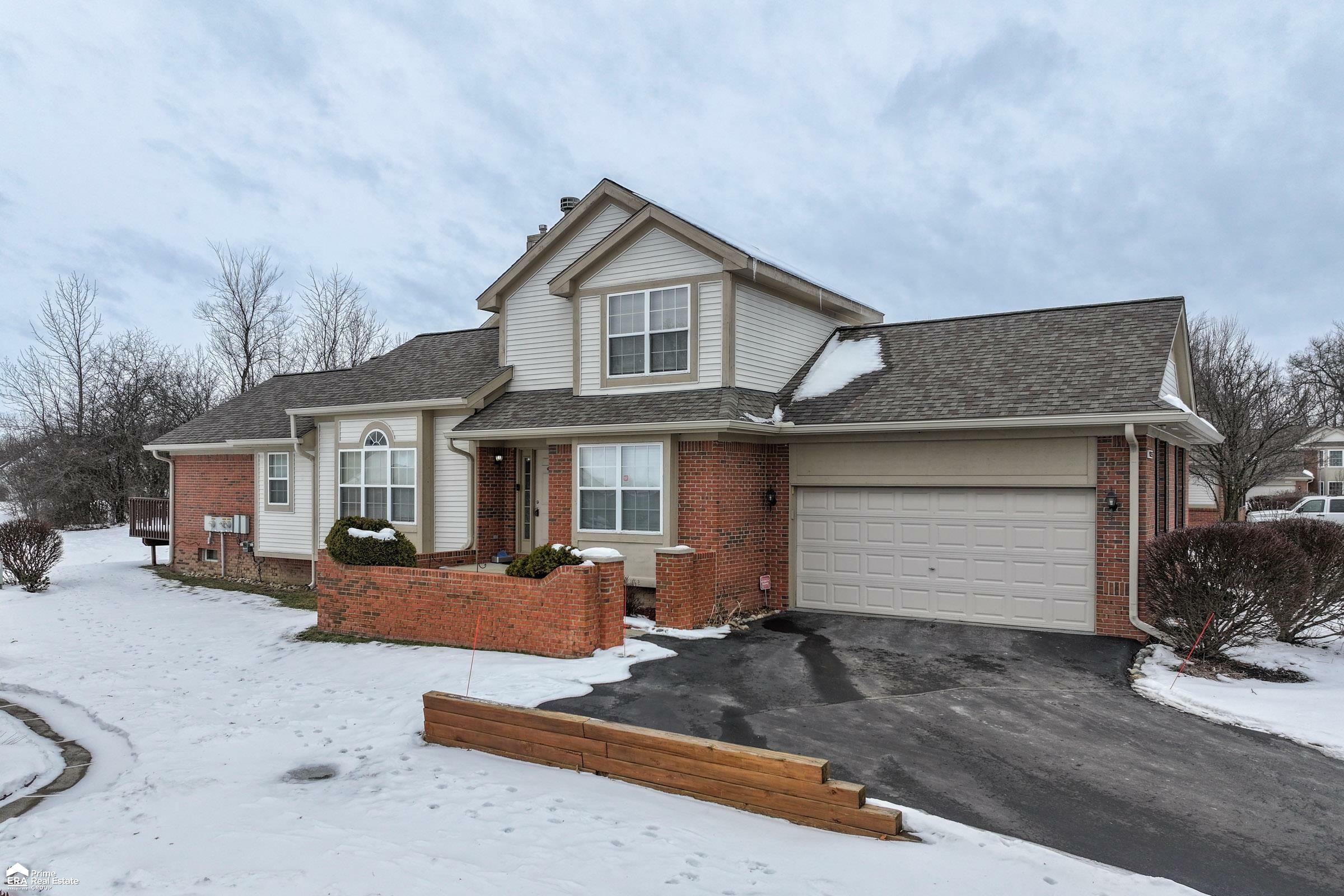 Property Photo:  10325 Champions Cir Circle  MI 48439 