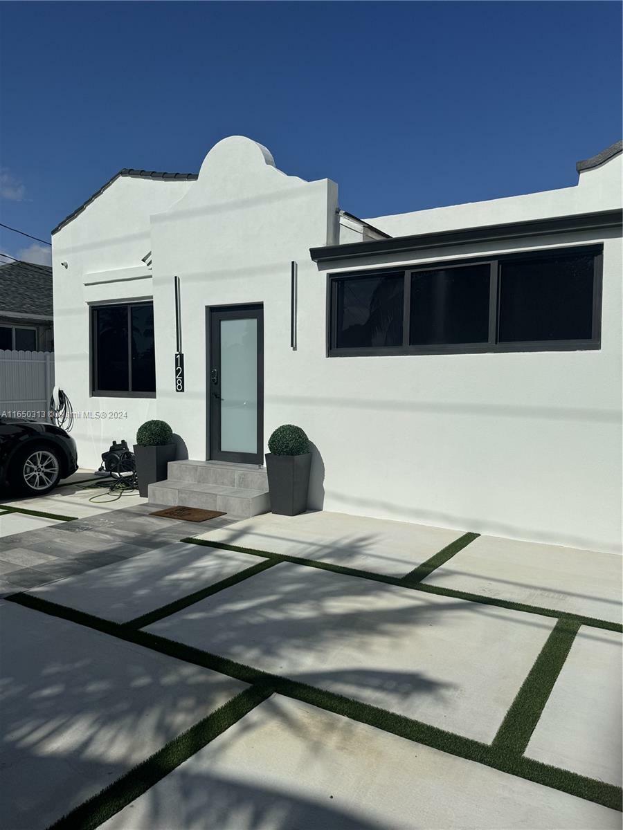 Property Photo:  128 NW 26th Ave  FL 33125 