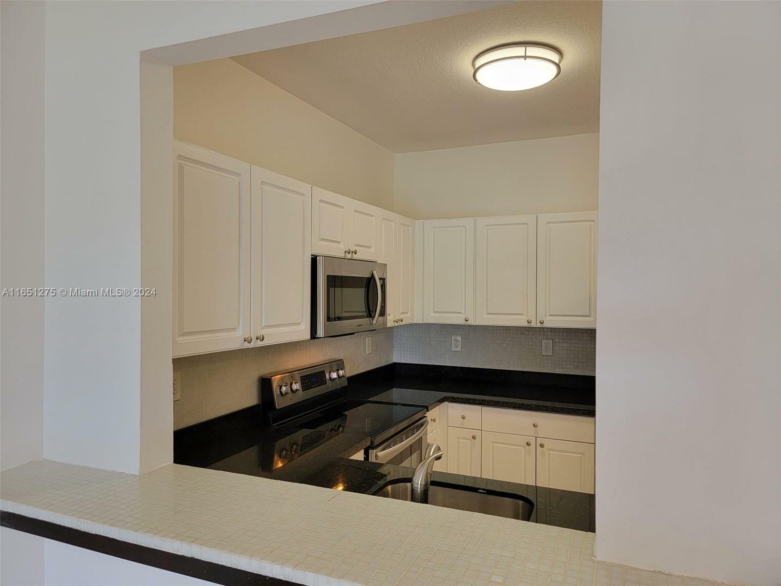 Property Photo:  1300 NE 109th St 403  FL 33161 