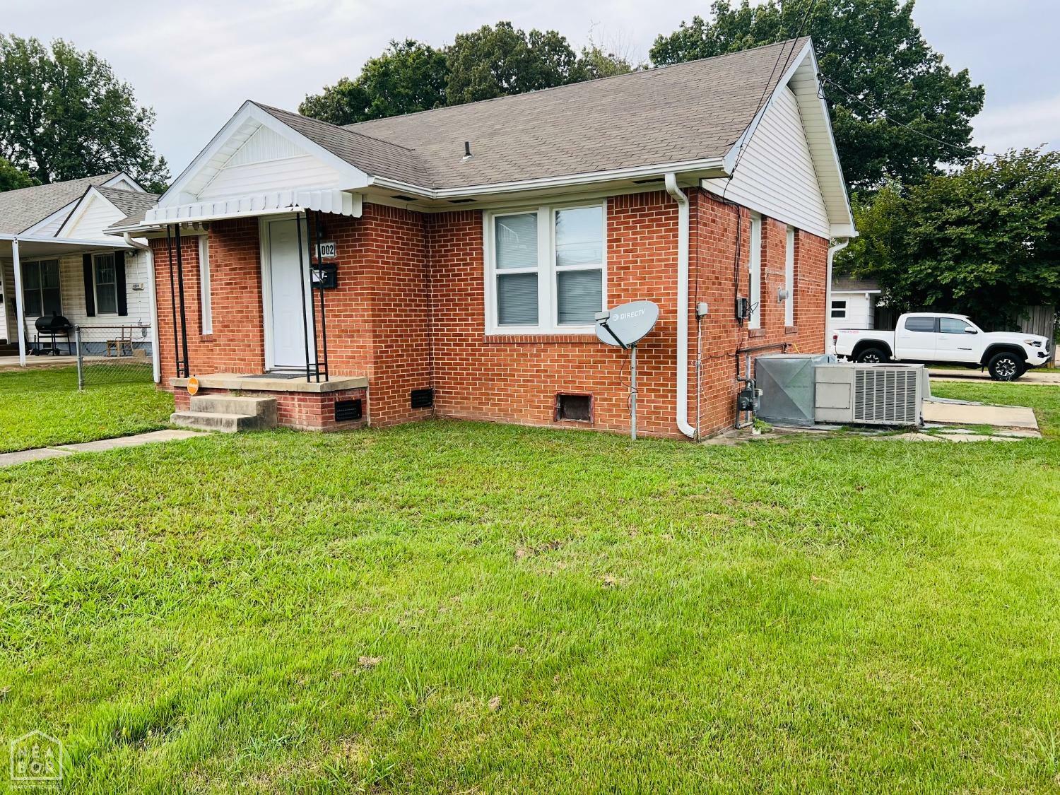 Property Photo:  1002 W Cherry Avenue  AR 72401 