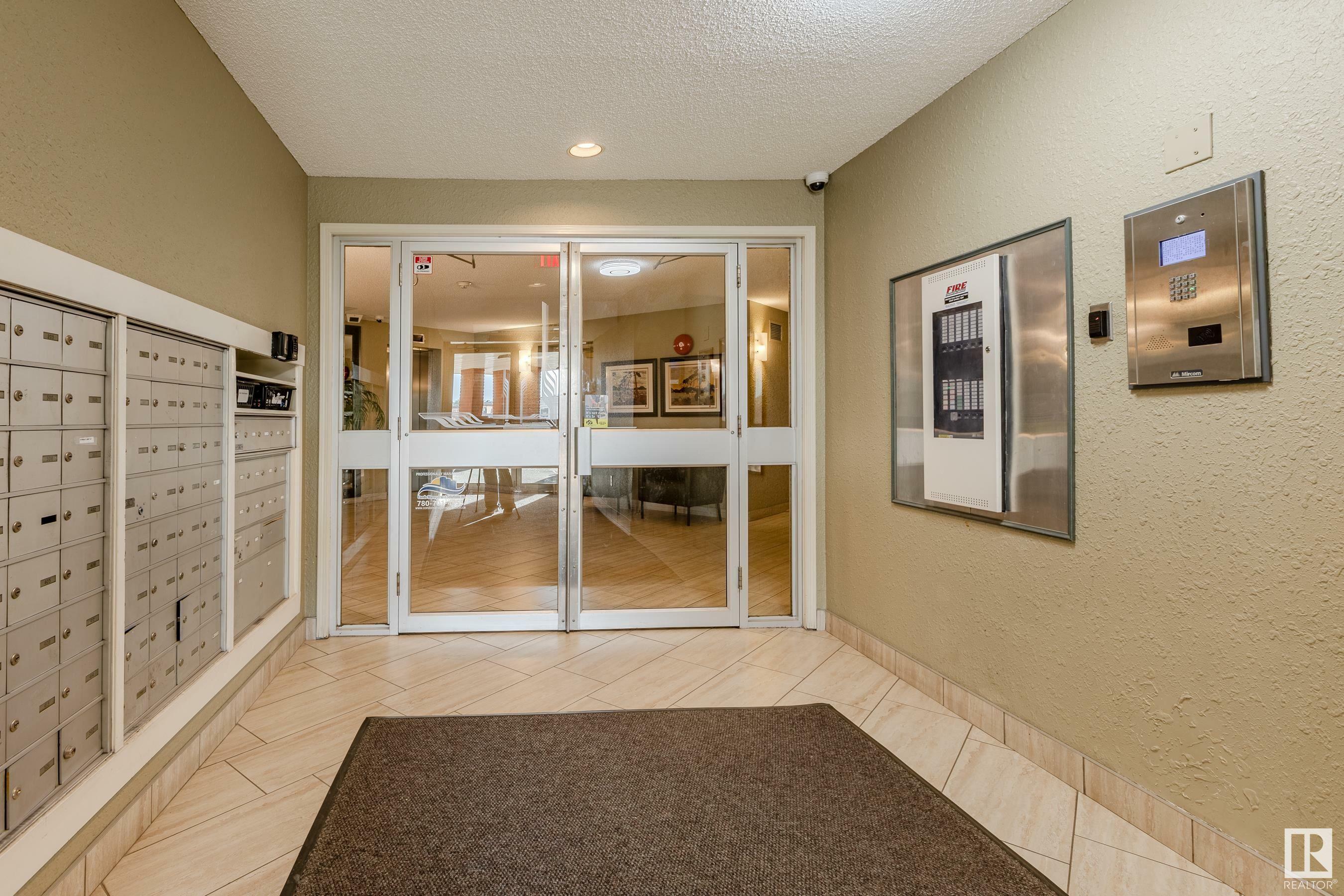 Property Photo:  3 Perron Street 308  AB T8N 5Z5 