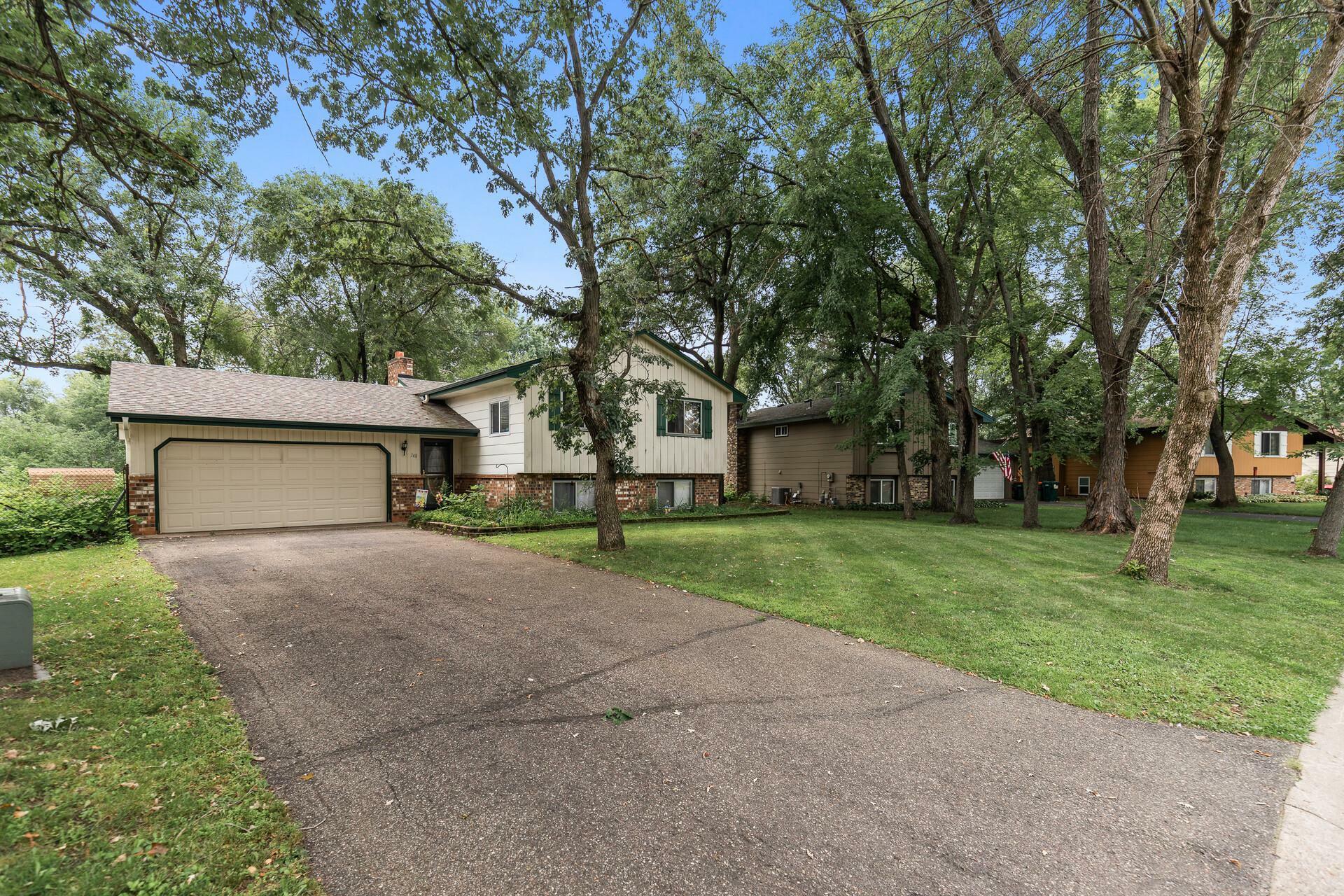 Property Photo:  748 129th Avenue NE  MN 55434 