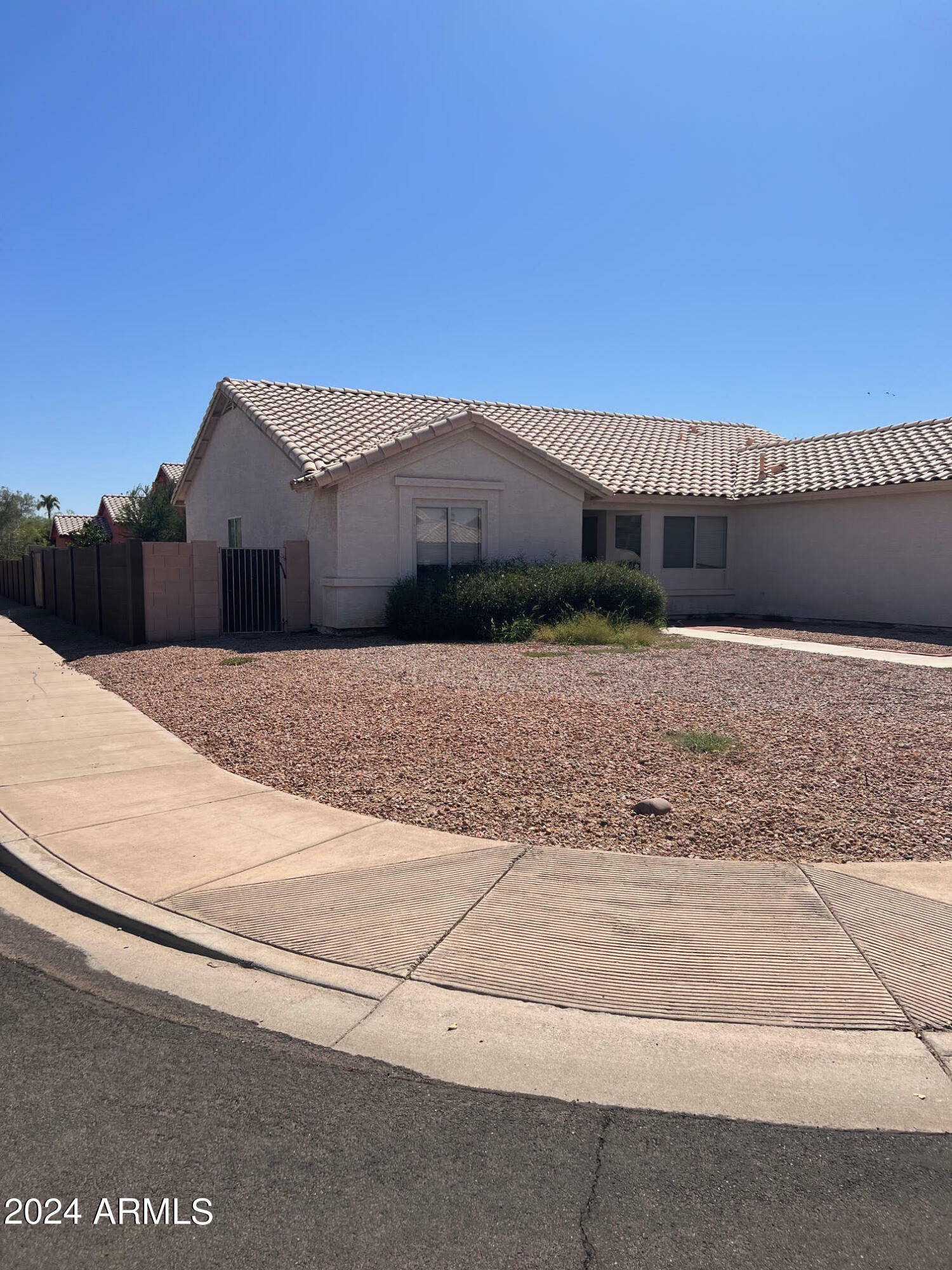 Property Photo:  16041 W Desert Bloom Street  AZ 85338 