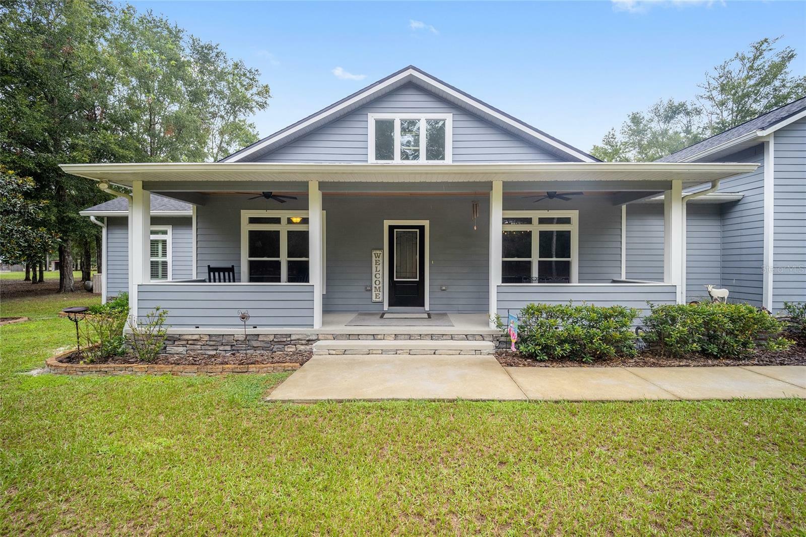 Property Photo:  3529 NE 64th Avenue  FL 32643 