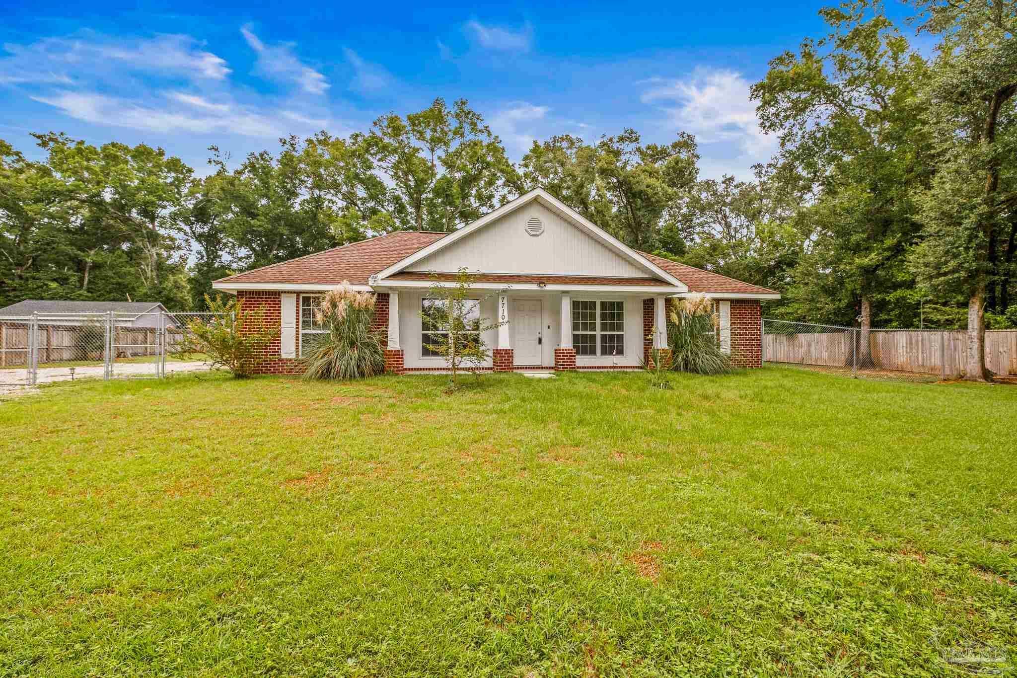 Property Photo:  7710 Jansen Rd  FL 32526 